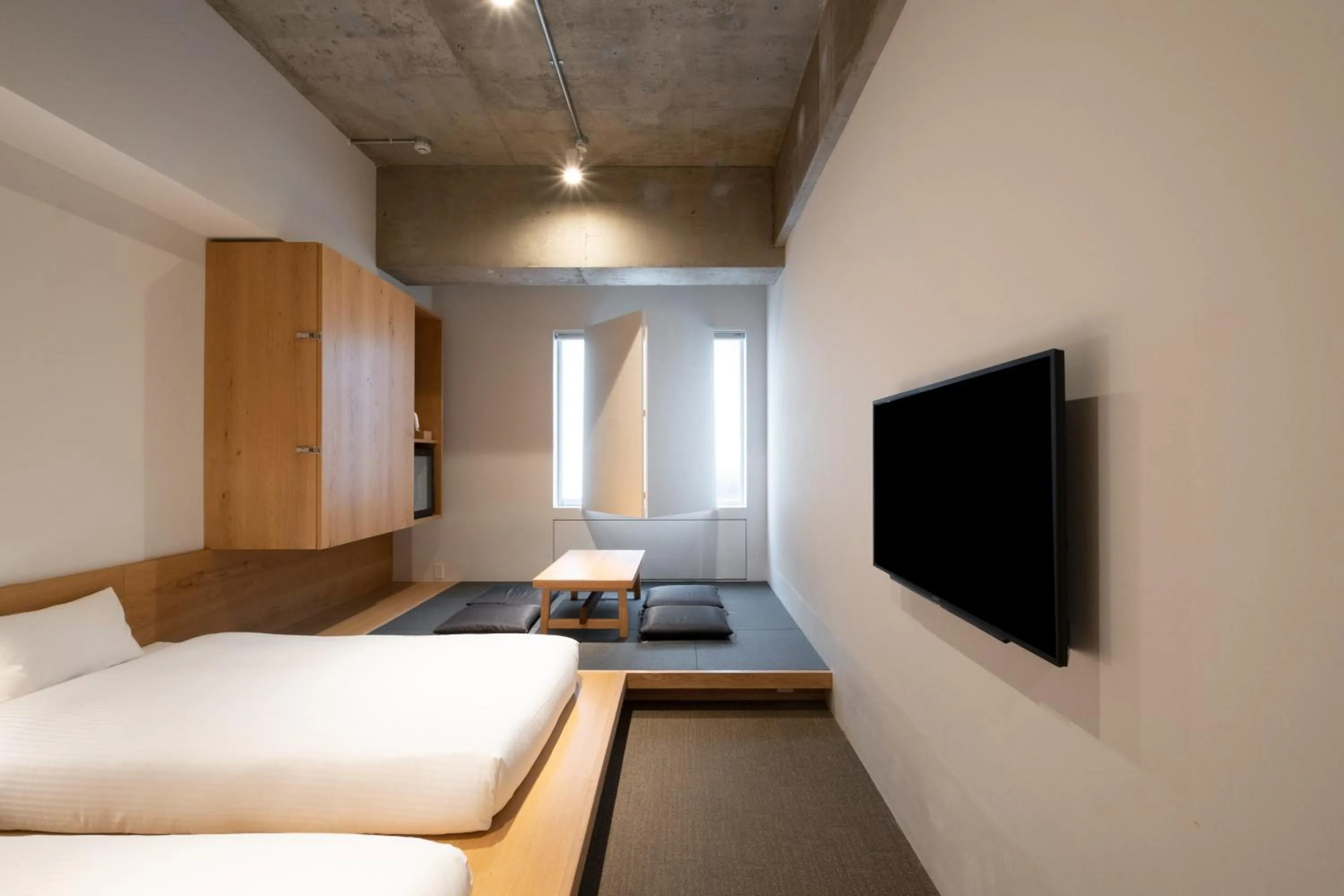Photo of the whole room, Bed in TSUGU Kyoto Sanjo by THE SHARE HOTELS