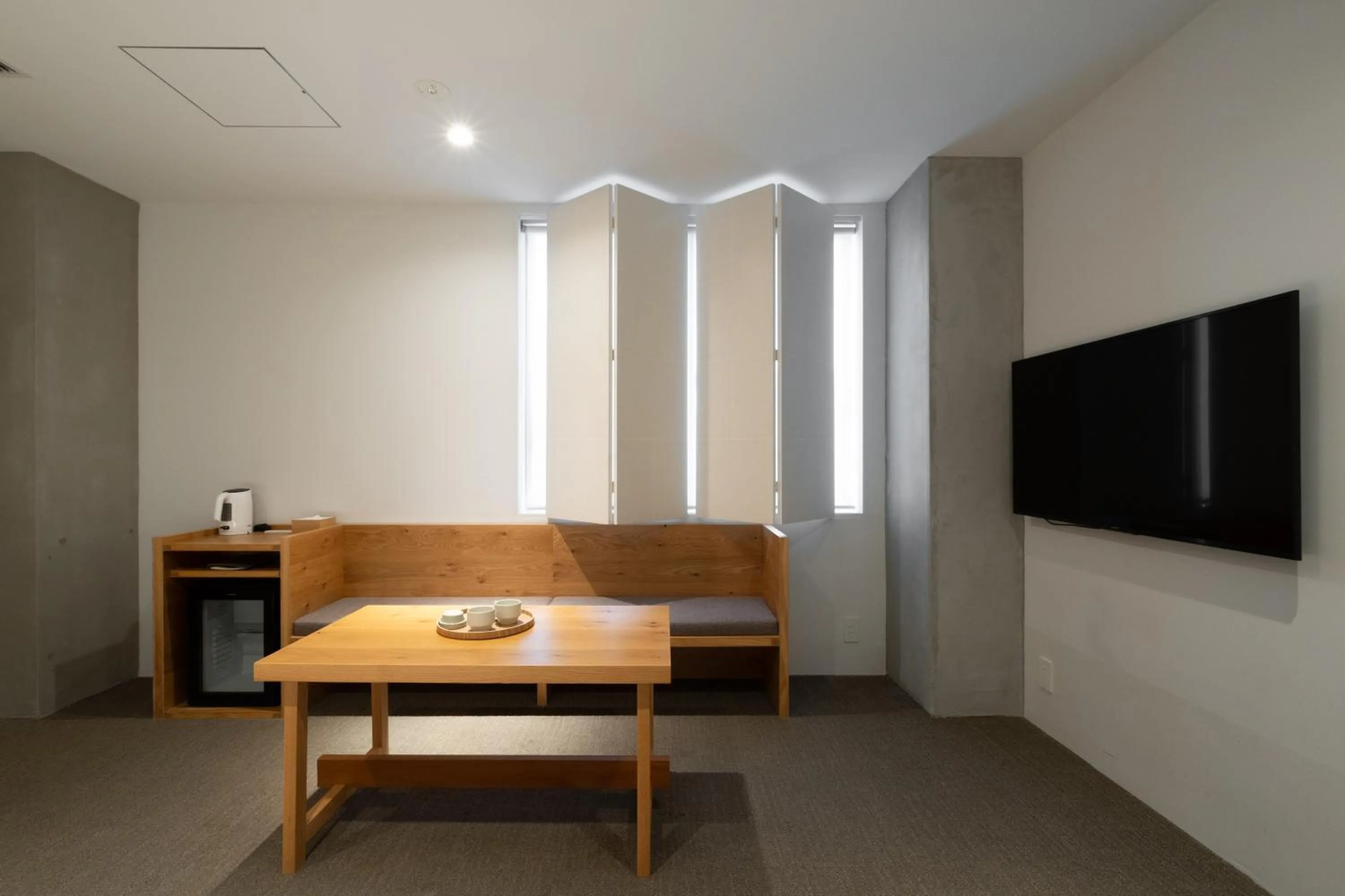 Photo of the whole room in TSUGU Kyoto Sanjo by THE SHARE HOTELS