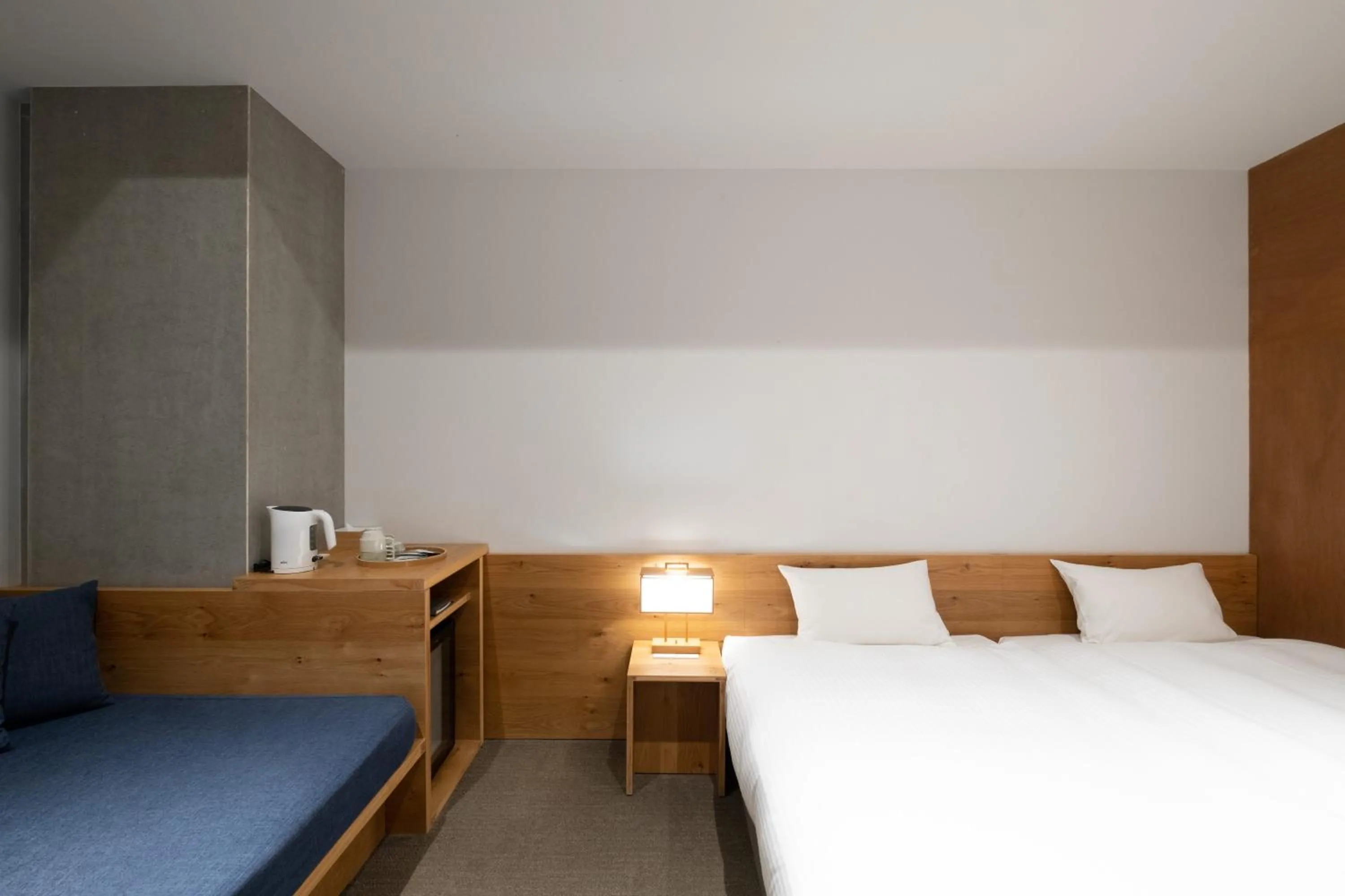 Photo of the whole room, Bed in TSUGU Kyoto Sanjo by THE SHARE HOTELS