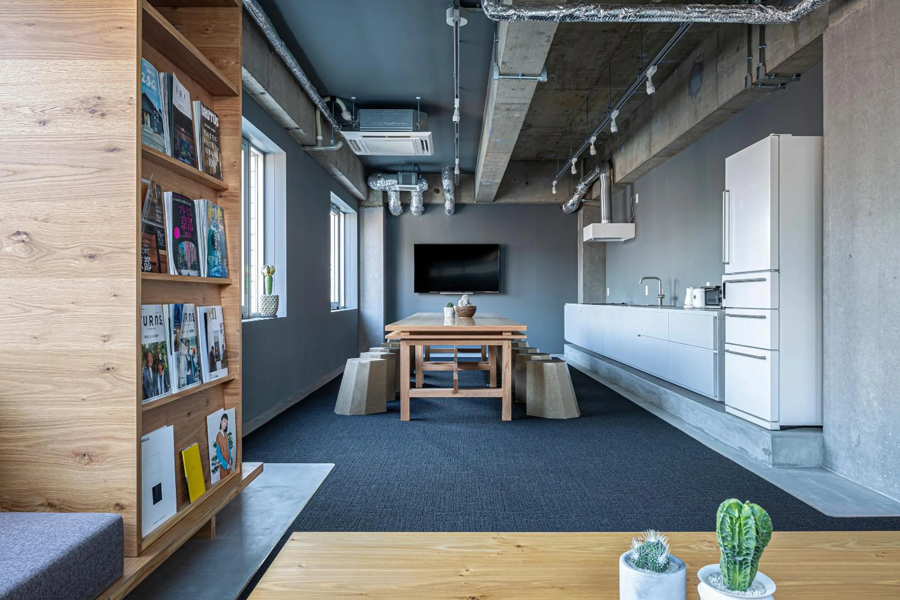 Communal kitchen in TSUGU Kyoto Sanjo by THE SHARE HOTELS