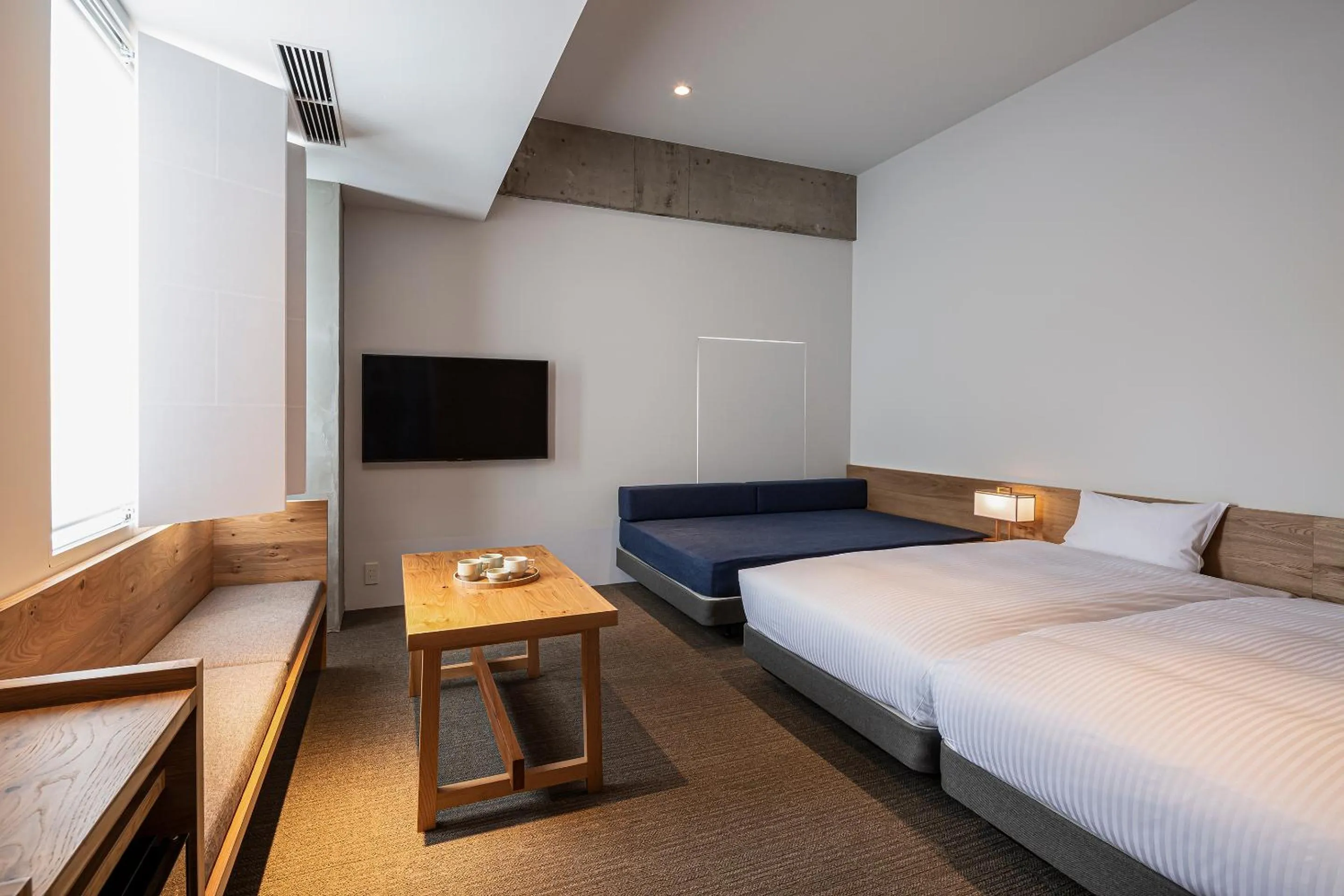 Photo of the whole room, Bed in TSUGU Kyoto Sanjo by THE SHARE HOTELS