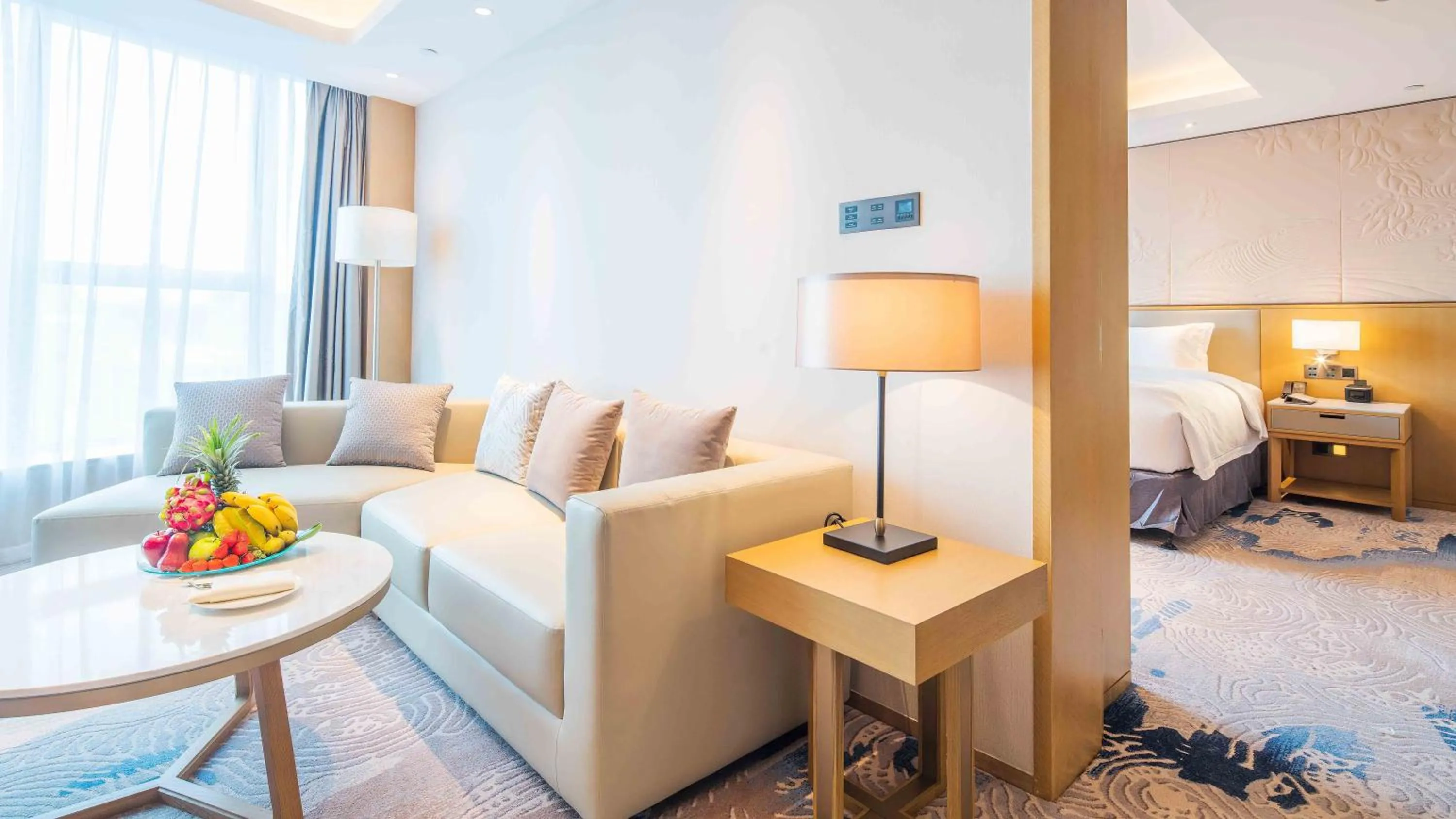 Living room, Bed in Wyndham Grand Plaza Royale Yuzhou Xiamen Wuyuan Bay