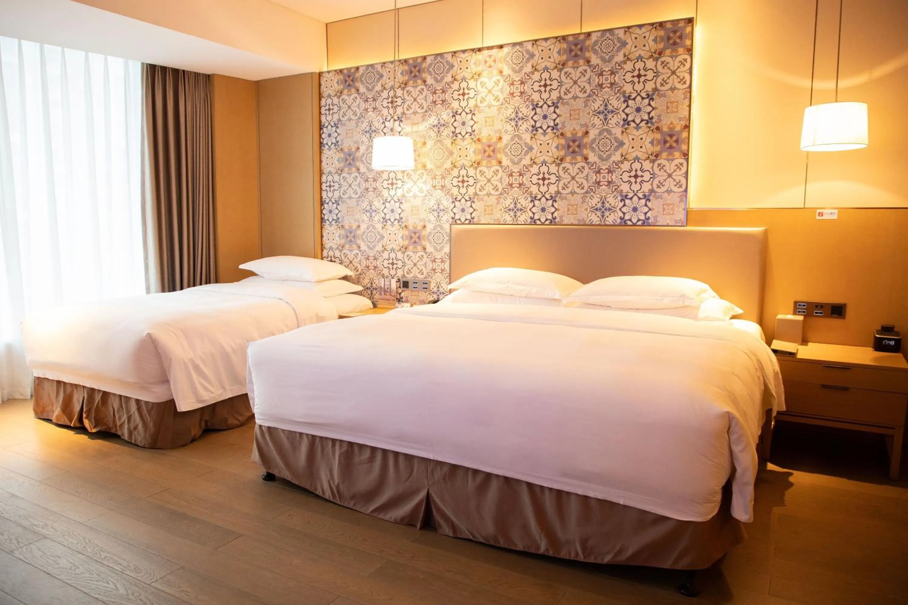Photo of the whole room, Bed in Wyndham Grand Plaza Royale Yuzhou Xiamen Wuyuan Bay