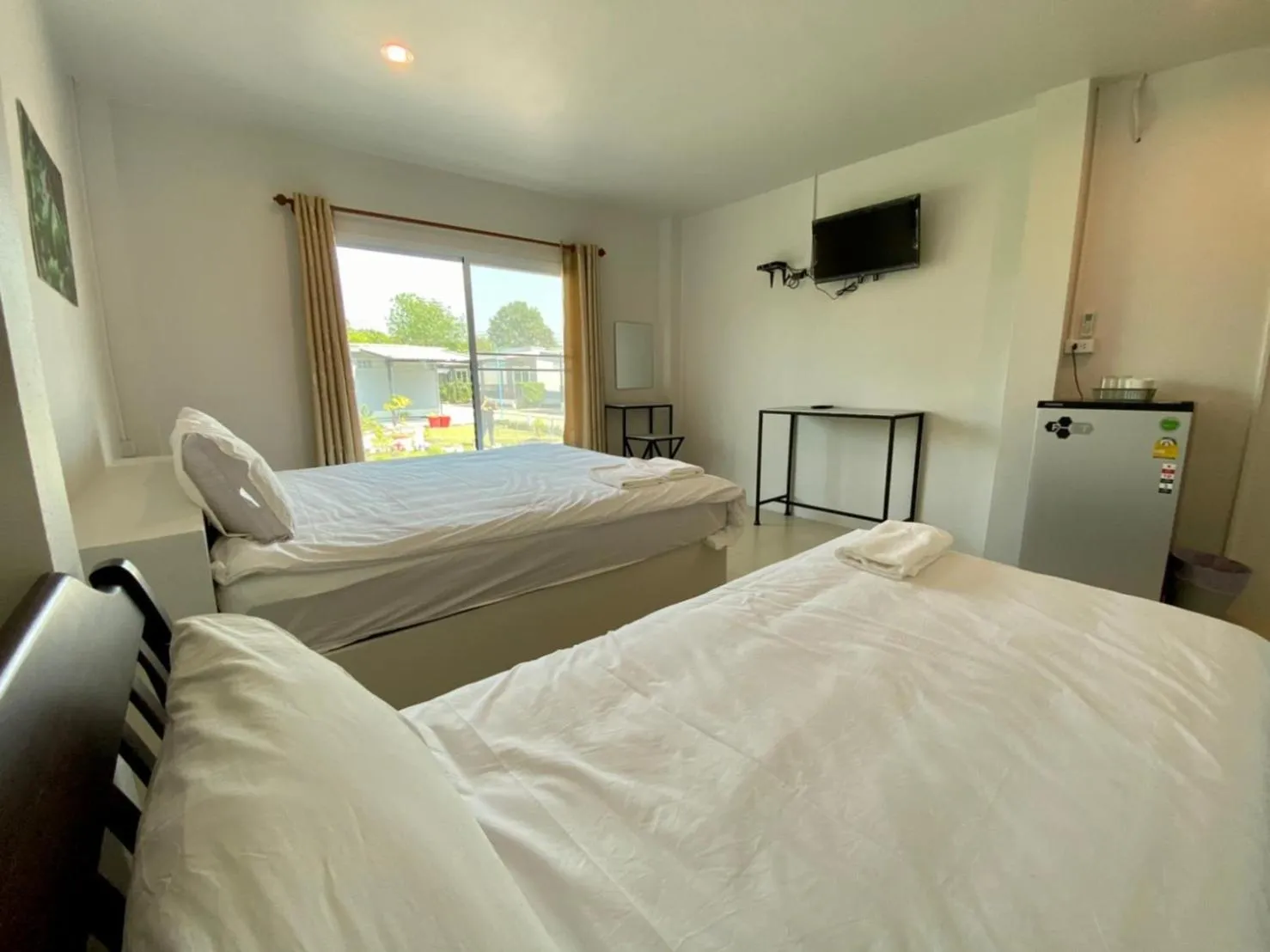 Bed in Baan Ruay Suk Resort, Lopburi