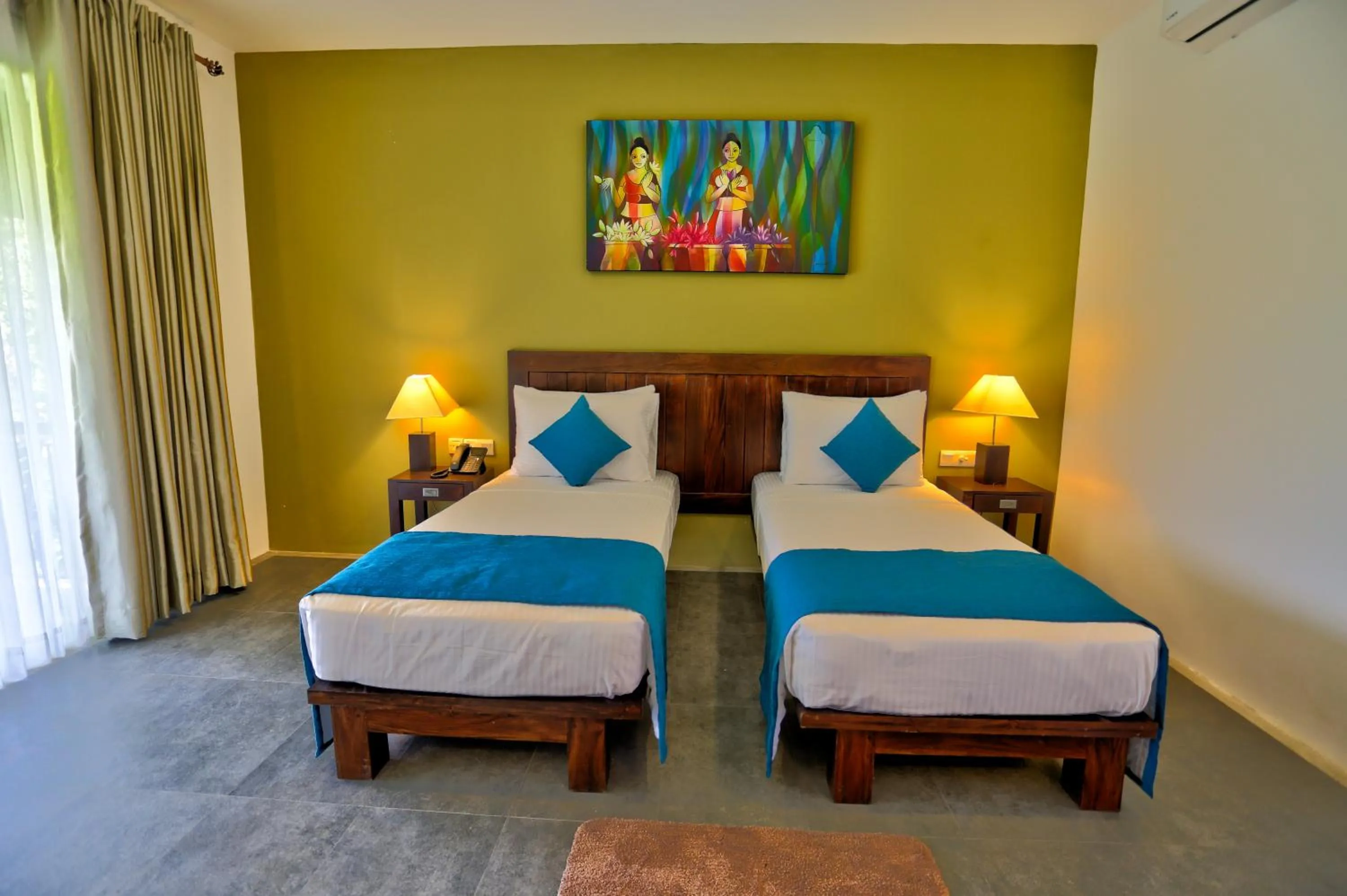 Bed in Tropical Life Resort and Spa