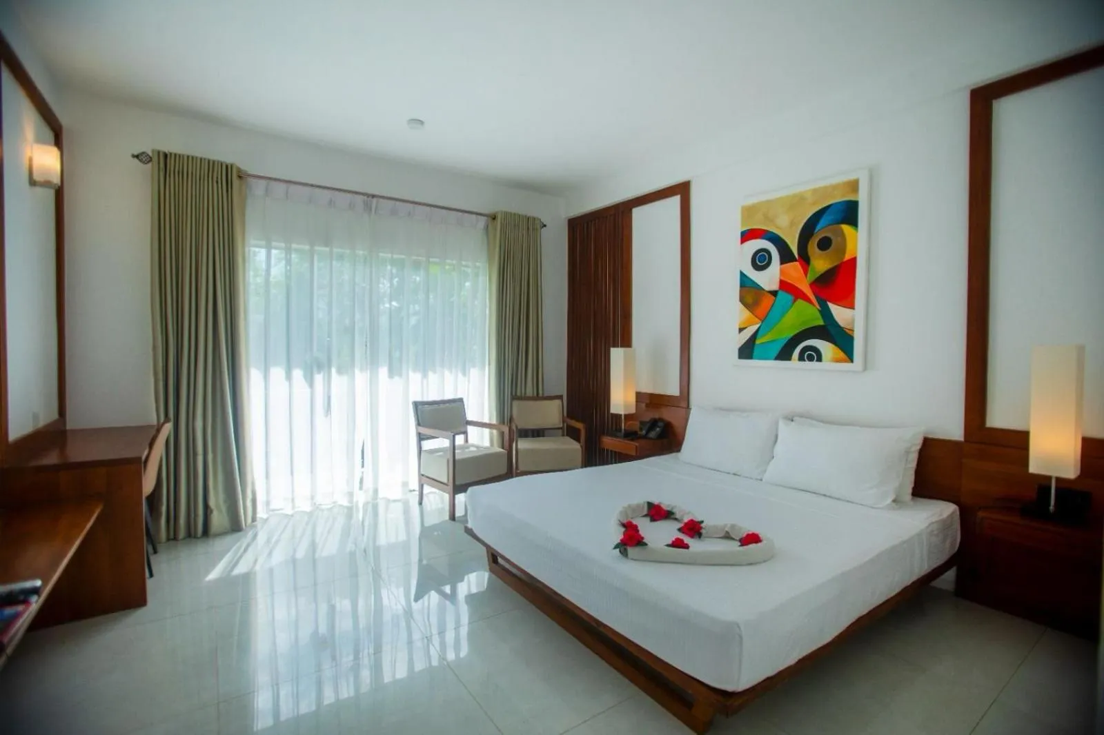 Bed in Tropical Life Resort and Spa