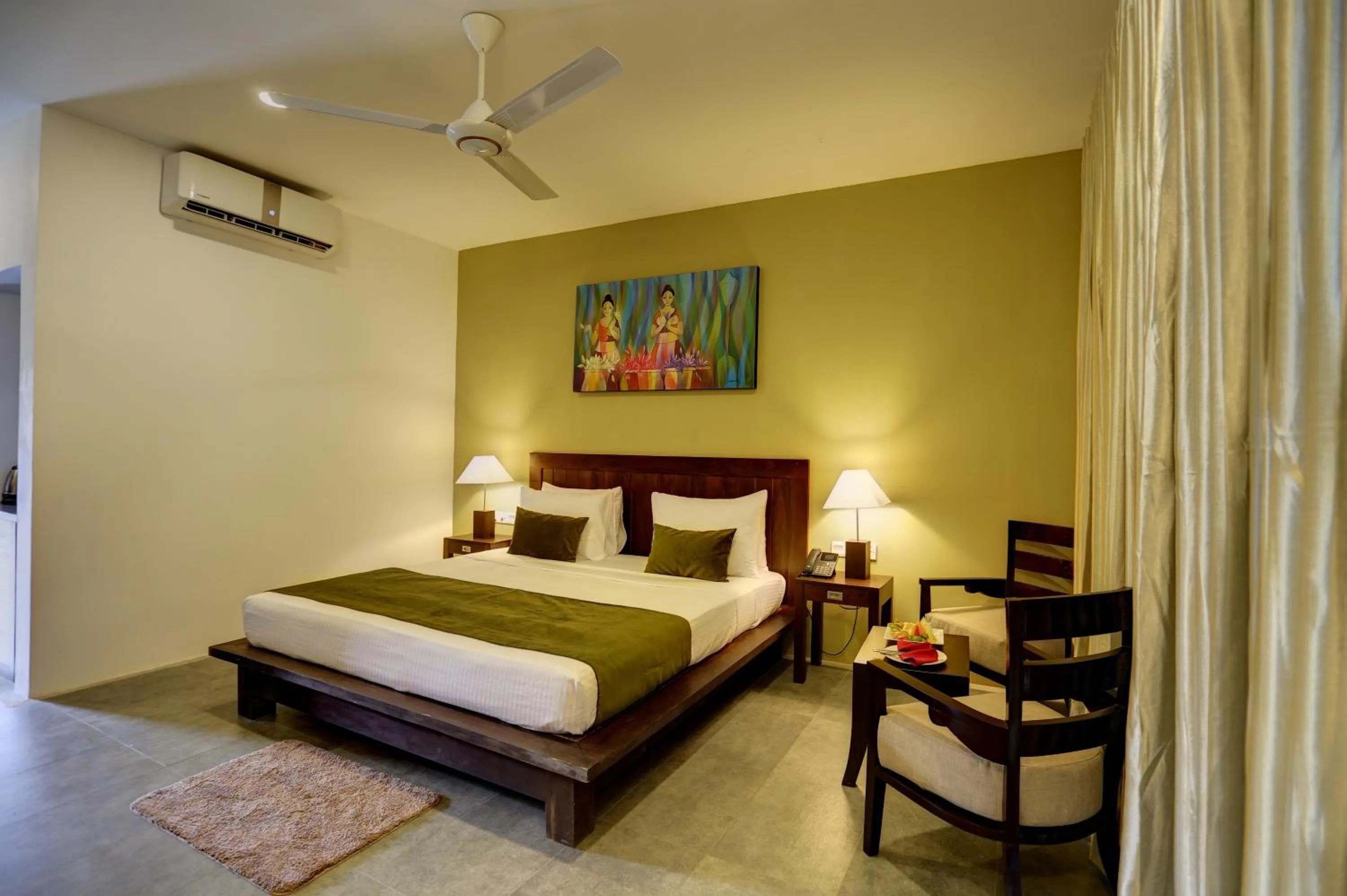 Bed in Tropical Life Resort and Spa