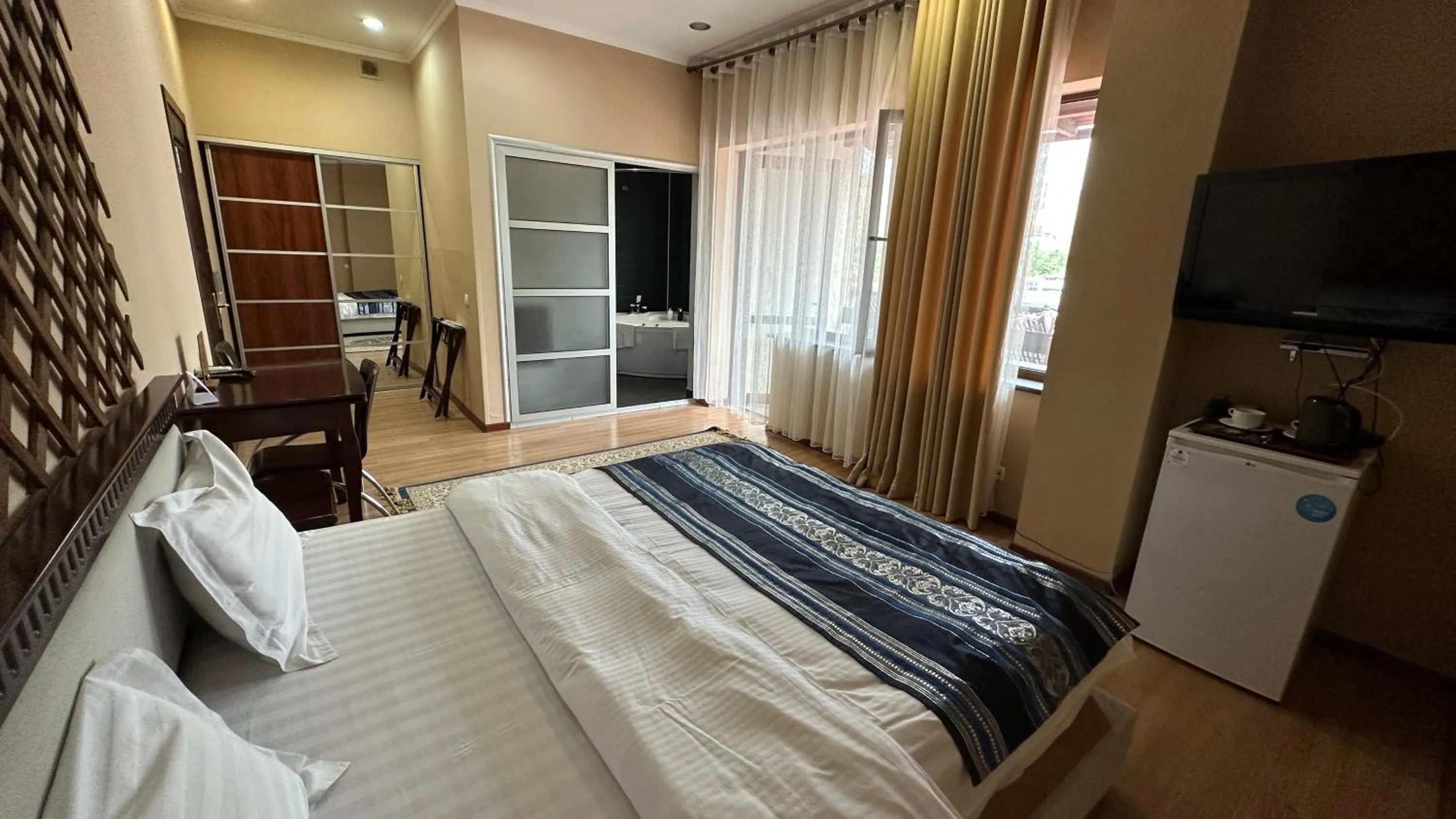 Bed in Tian-Shan Hotel