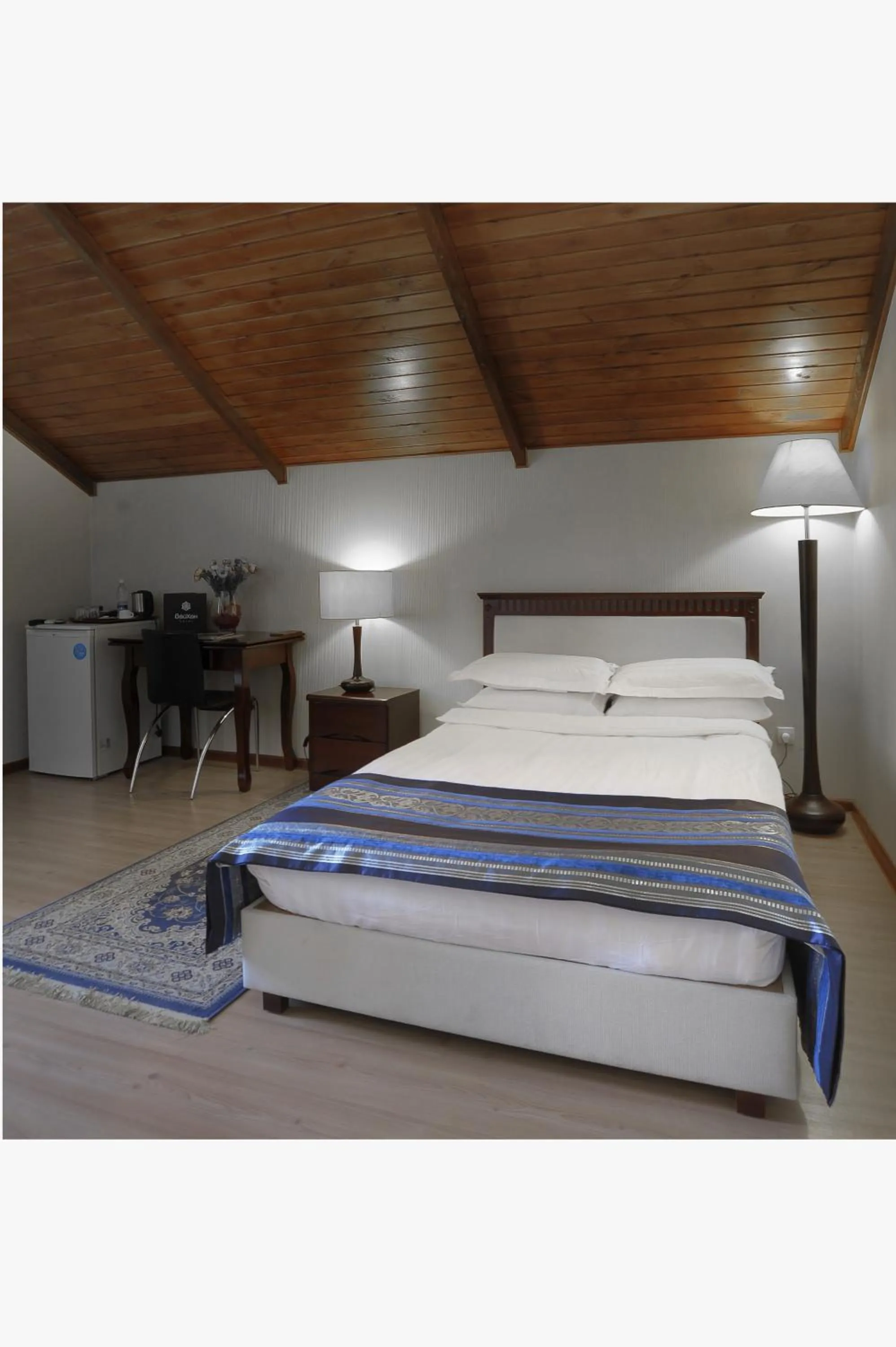 Bed in Tian-Shan Hotel