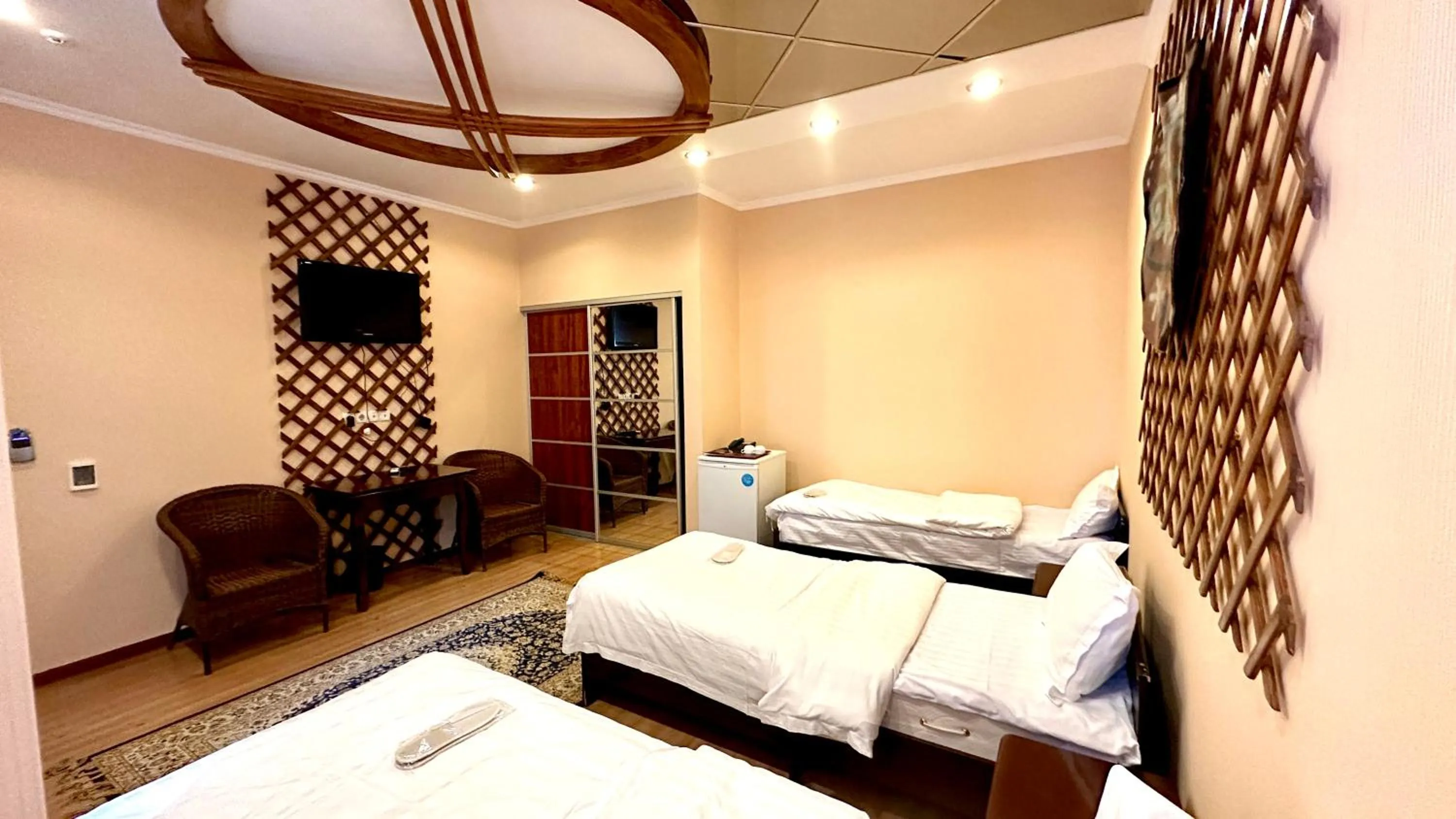 Bed in Tian-Shan Hotel