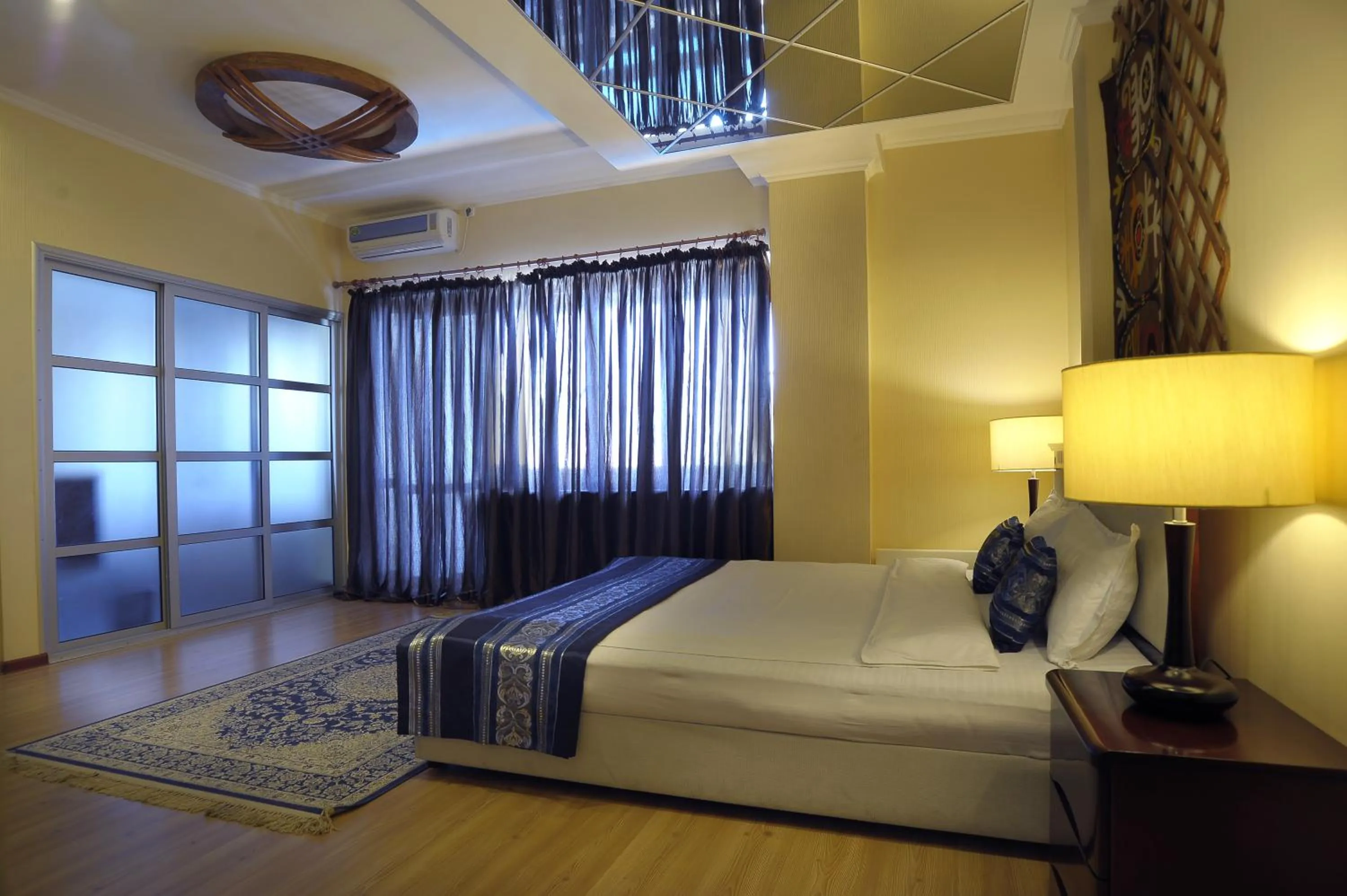 Bed in Tian-Shan Hotel