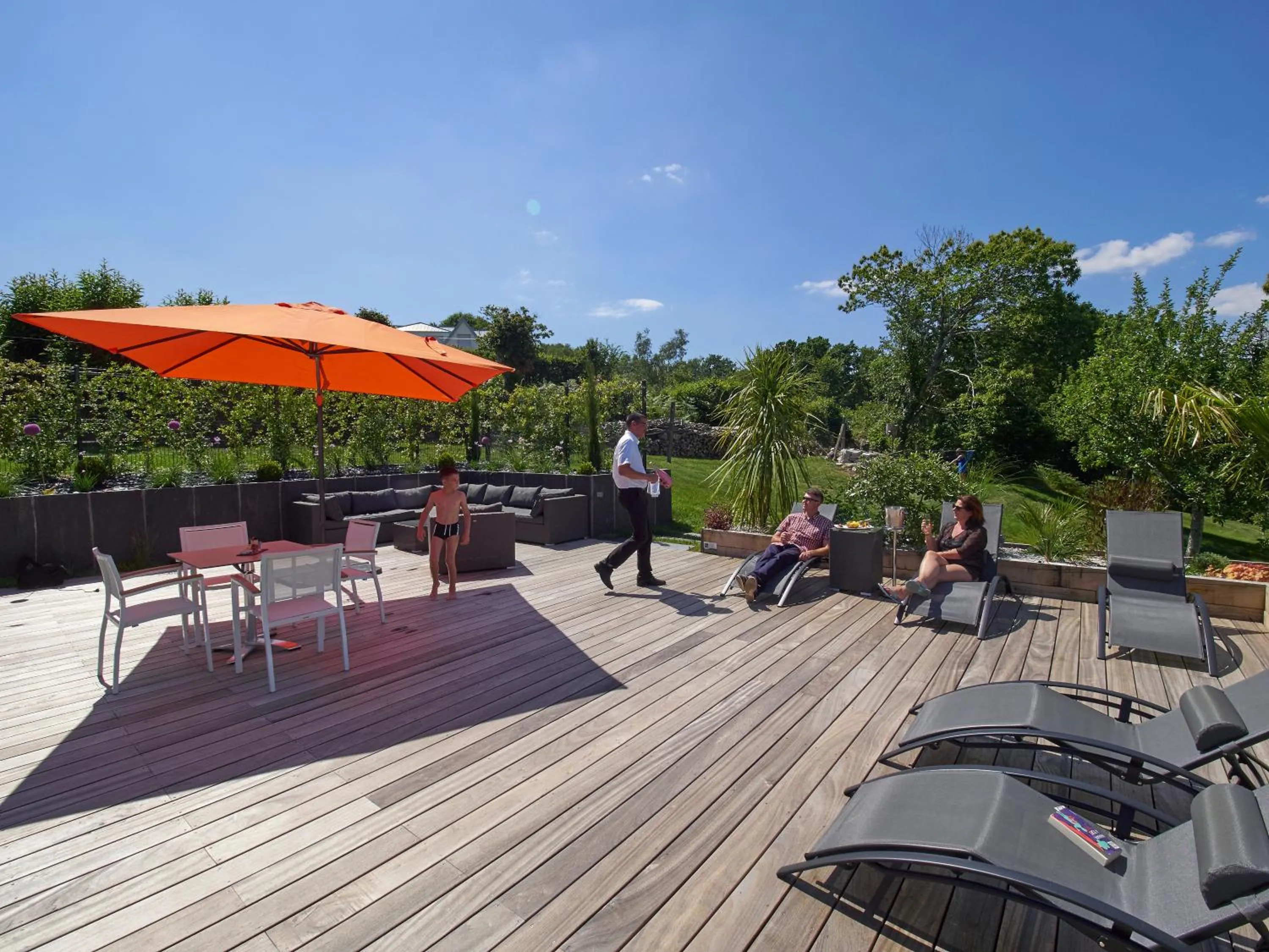 Patio in Logis Hotel Belle-Vue