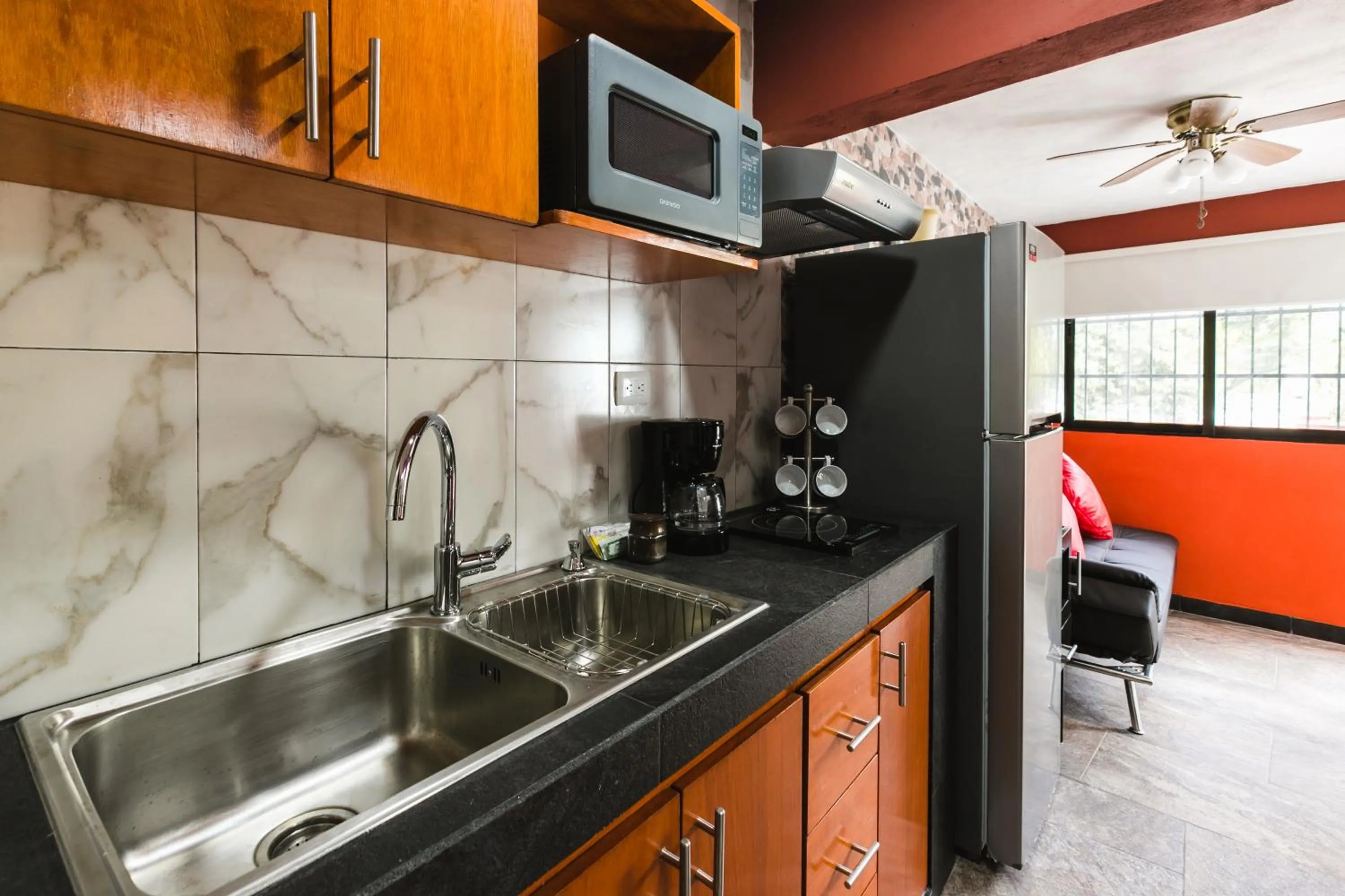Kitchen or kitchenette in Suite Studio Serviced Apartments
