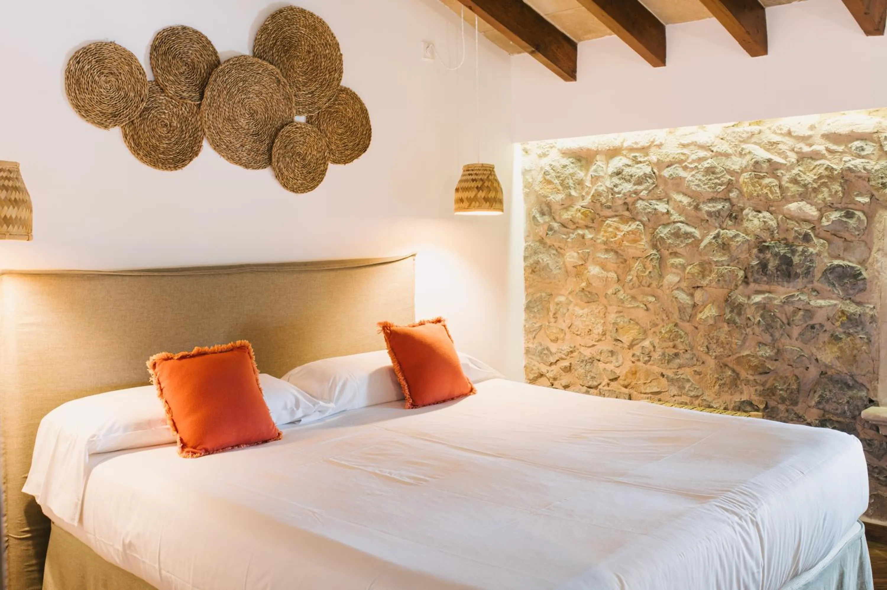 Bed in Curolla Petit Hotel