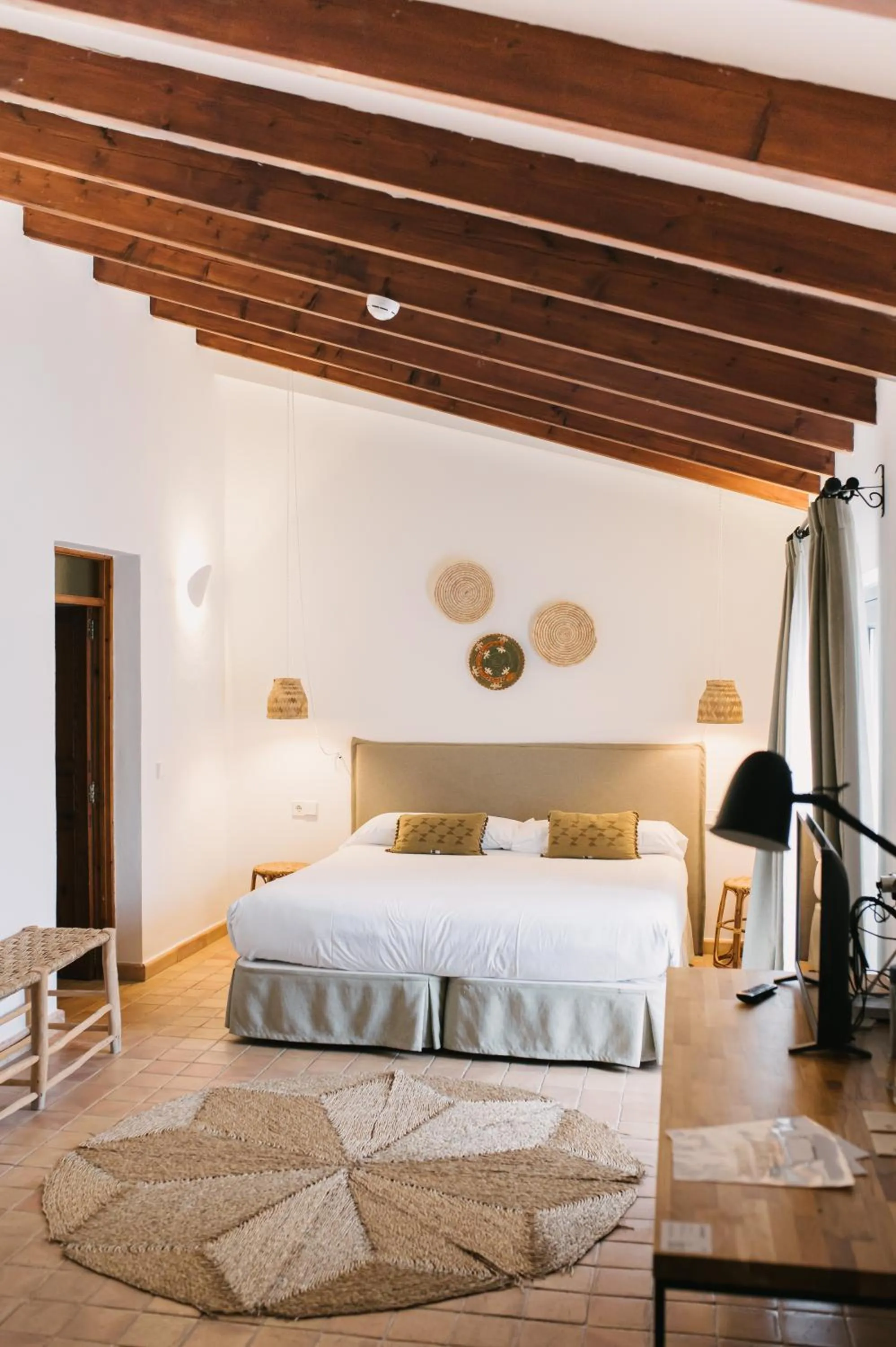 Bed in Curolla Petit Hotel