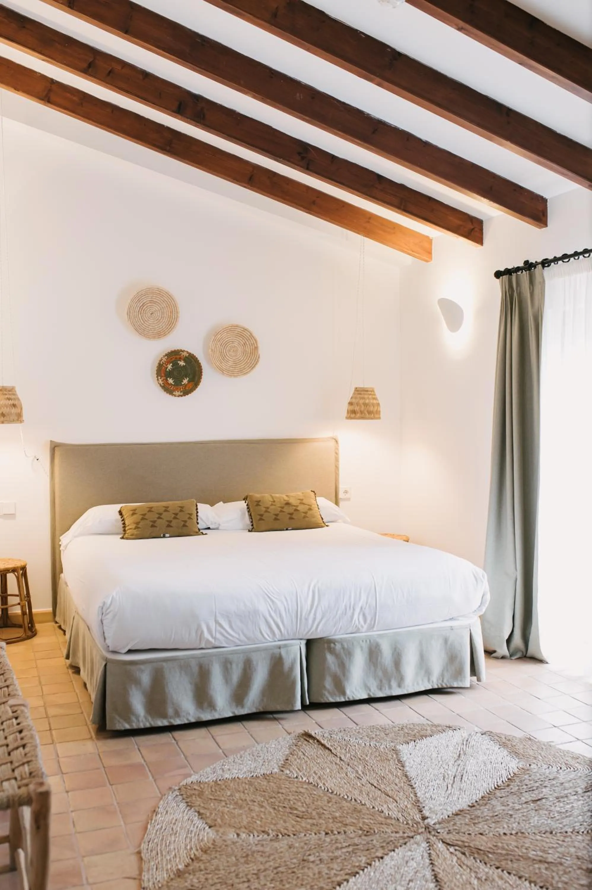 Bed in Curolla Petit Hotel