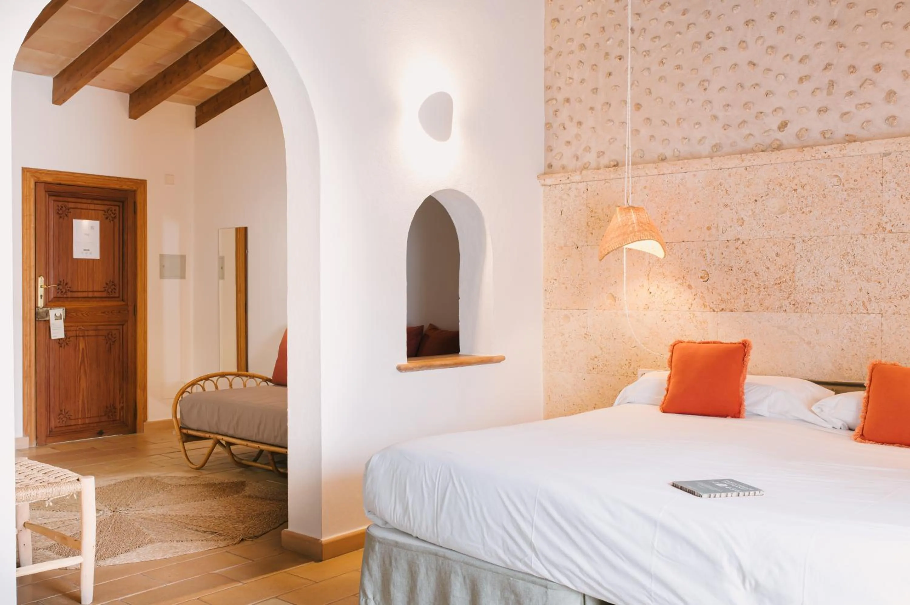 Bed in Curolla Petit Hotel