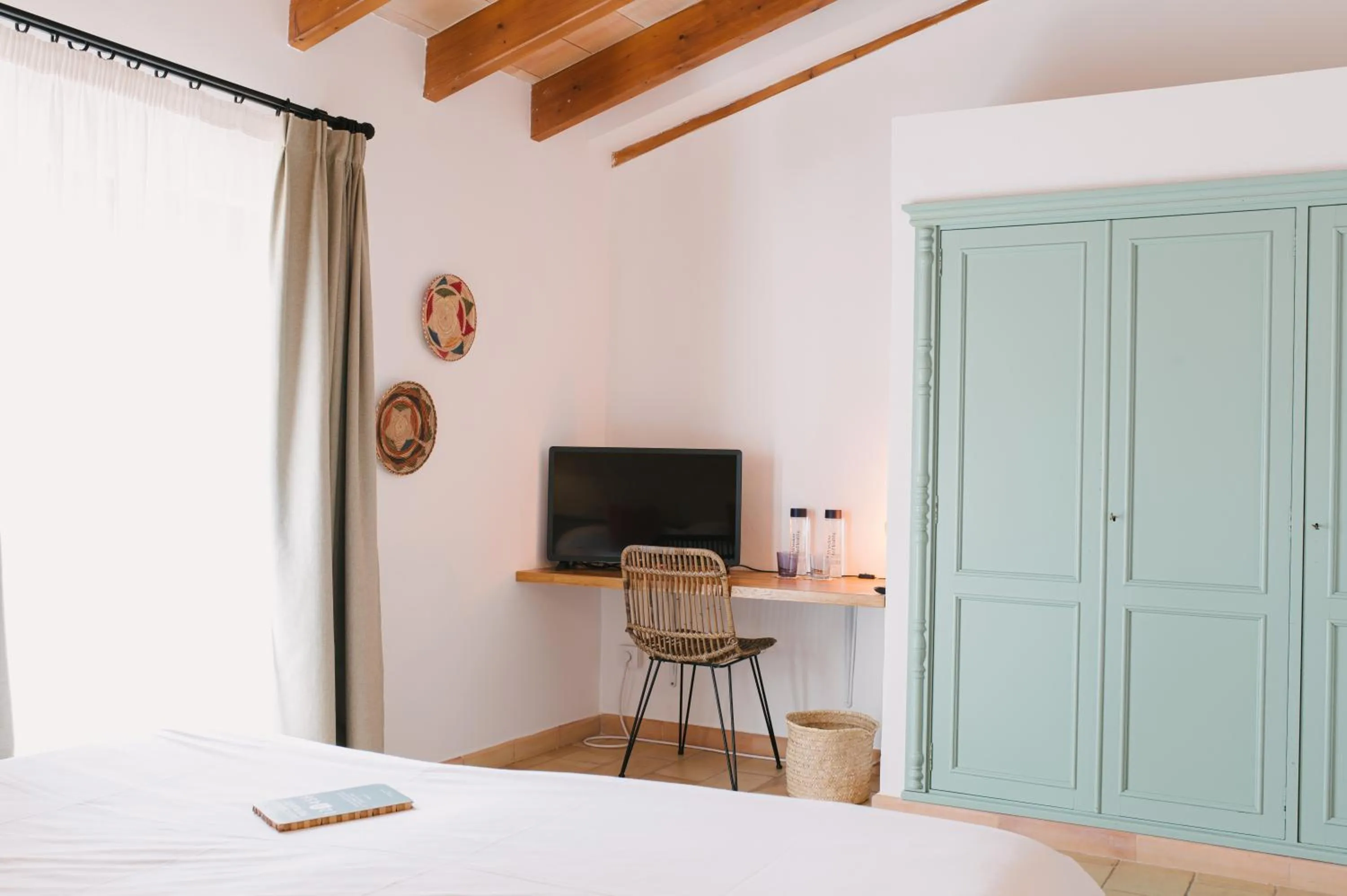 Bed in Curolla Petit Hotel