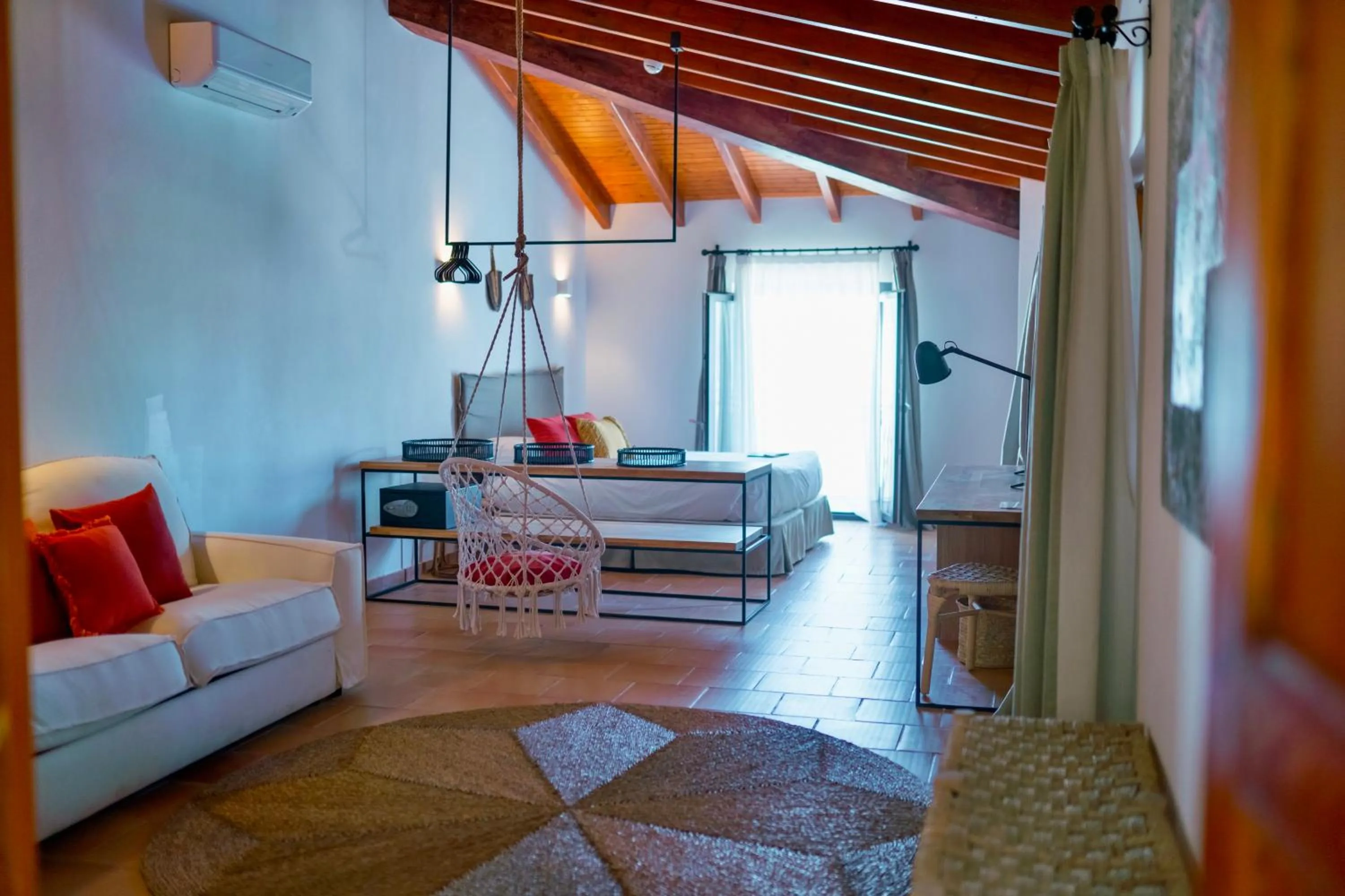 Bedroom in Curolla Petit Hotel