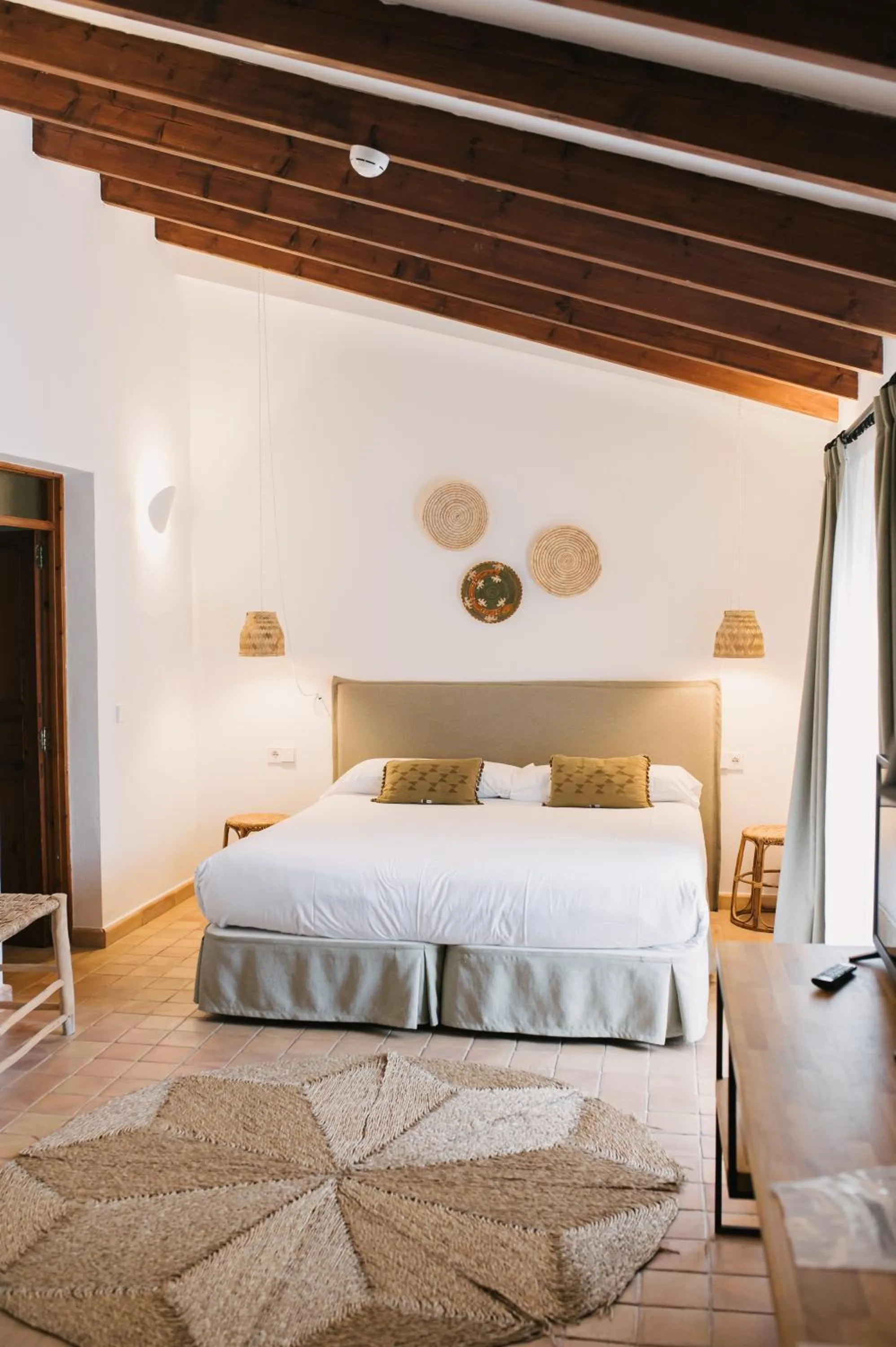 Bed in Curolla Petit Hotel