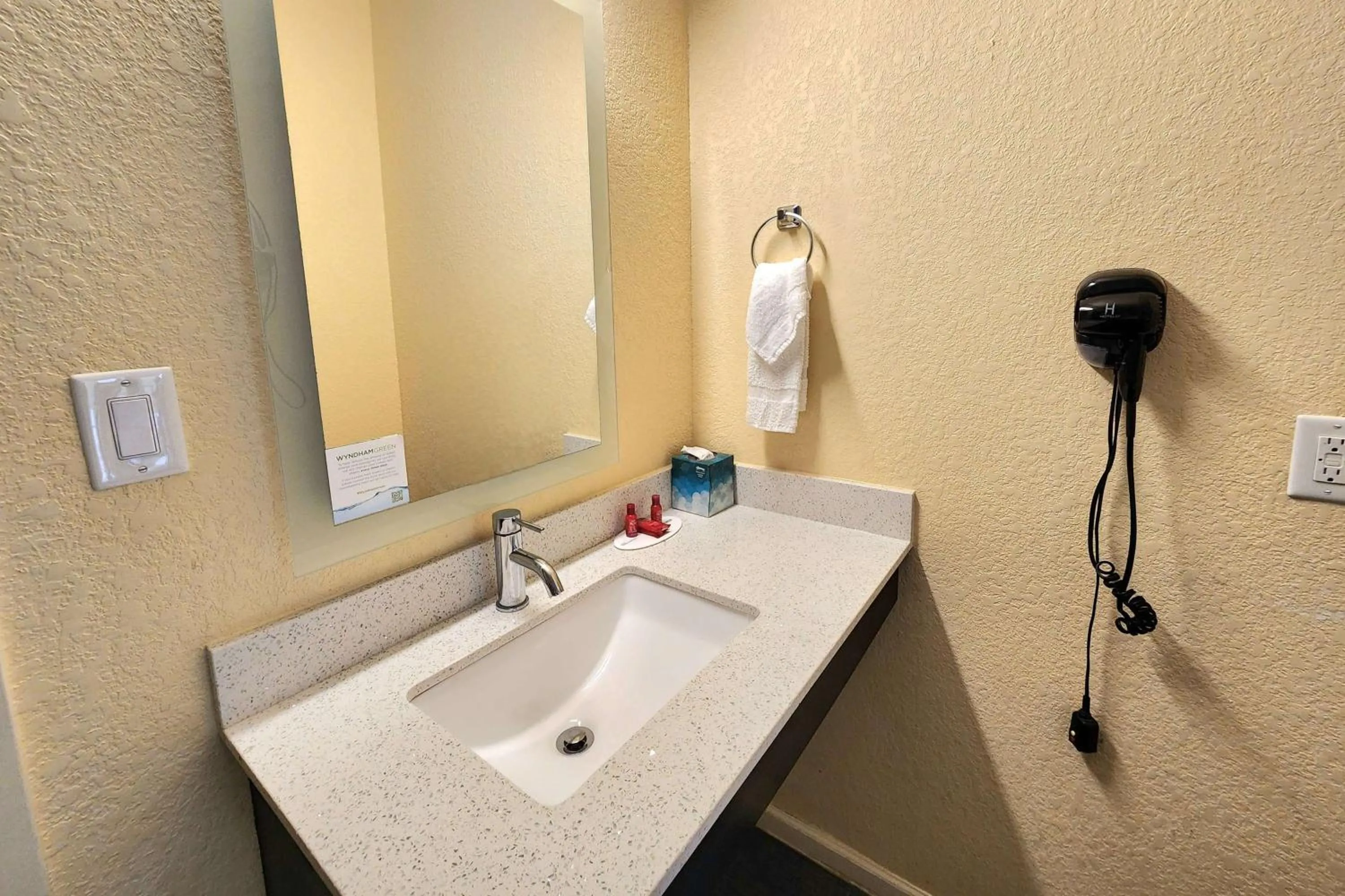 Bathroom in Days Inn by Wyndham Freeport
