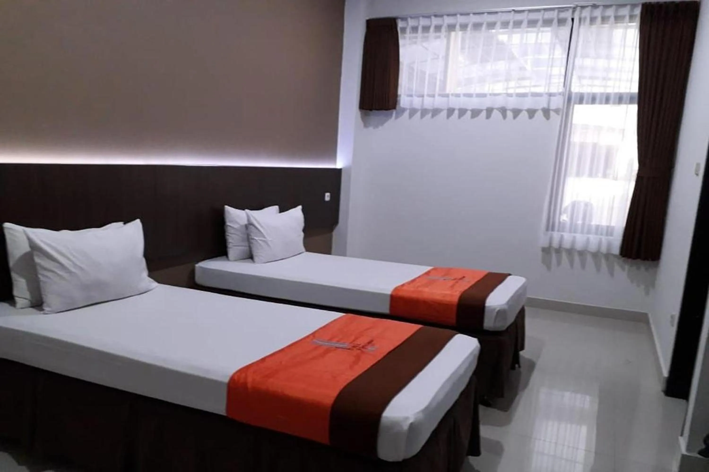 Bed in Hotel Bumi Makmur Indah