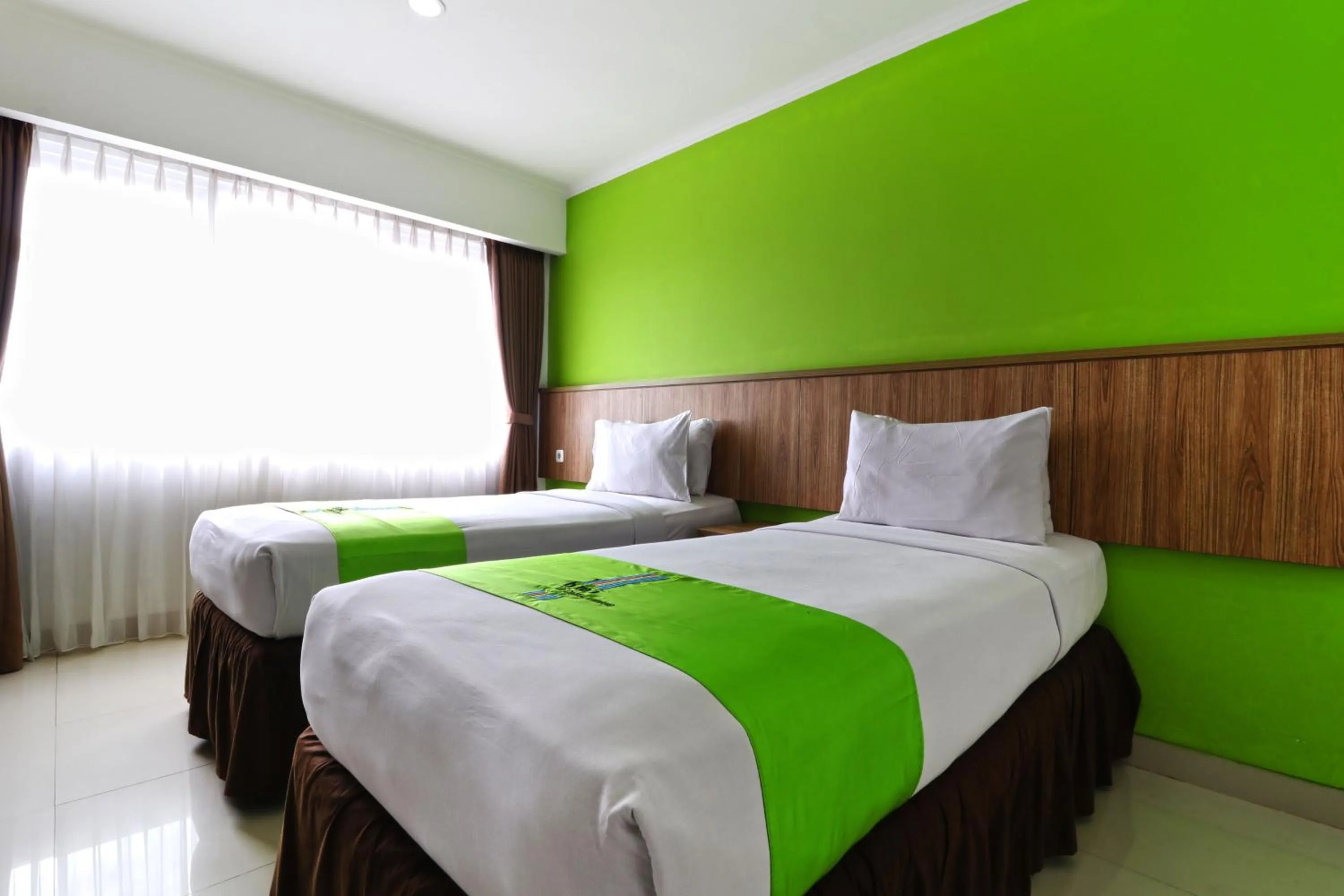 Bed in Hotel Bumi Makmur Indah