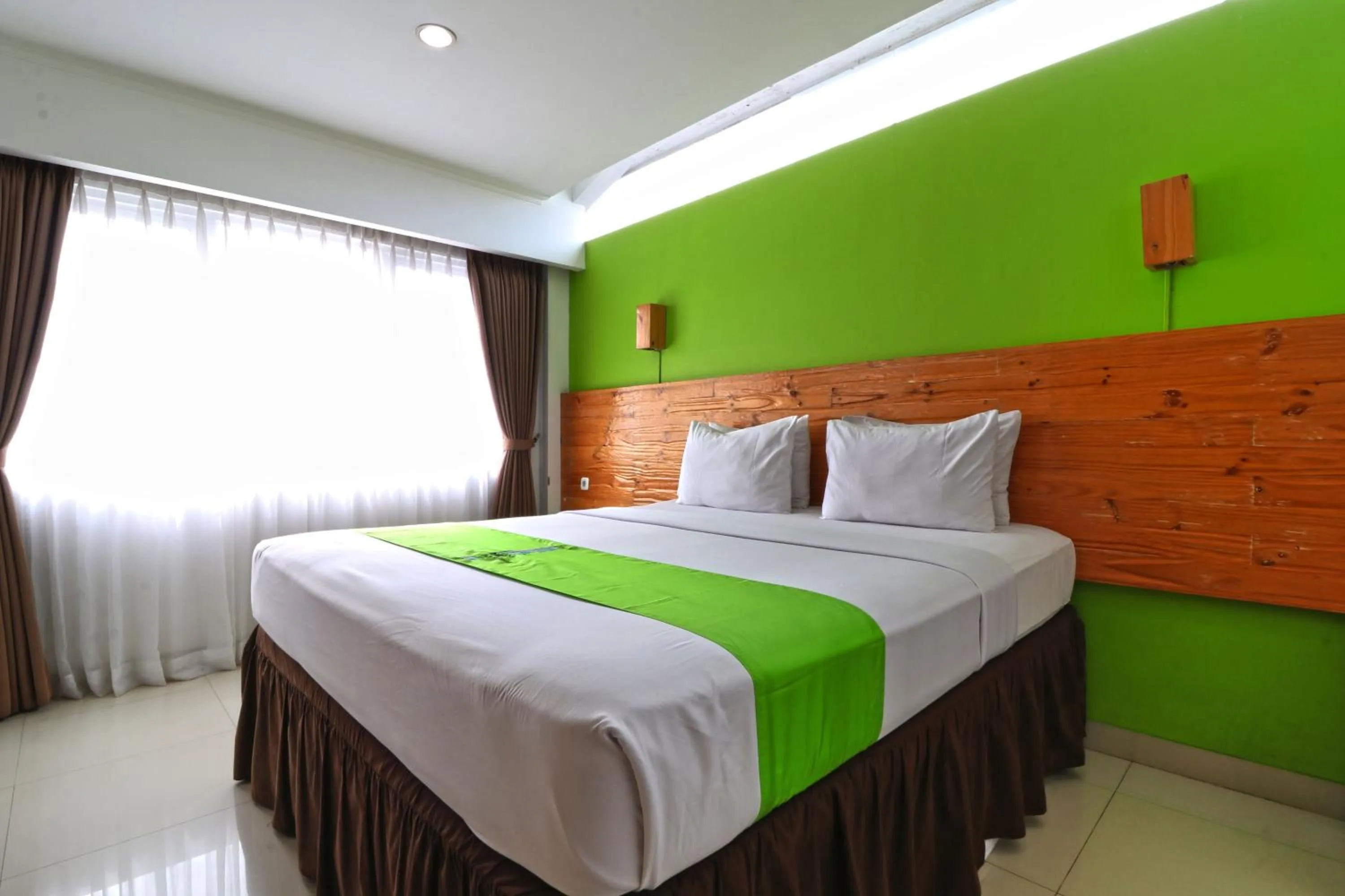 Bed in Hotel Bumi Makmur Indah