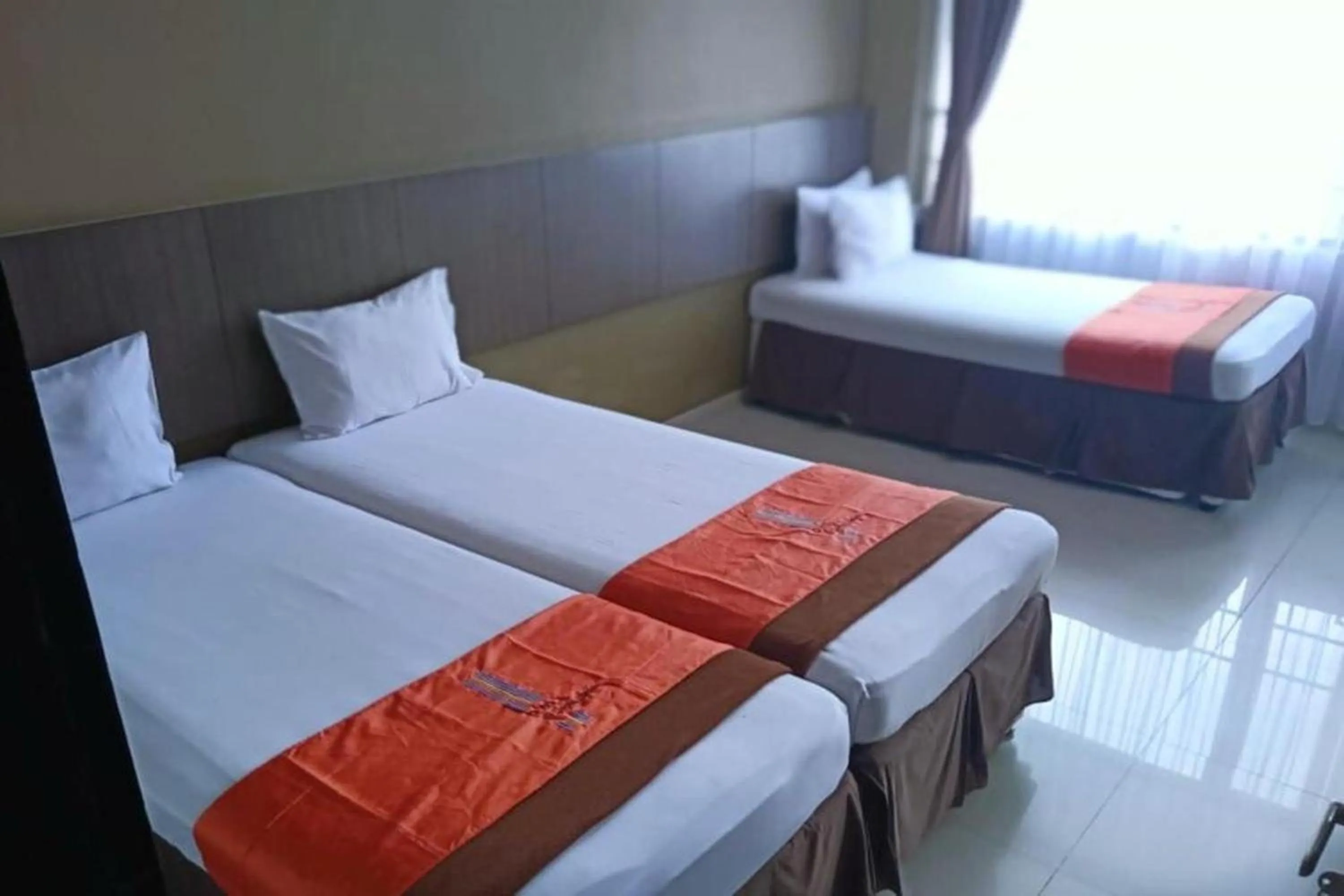 Bed in Hotel Bumi Makmur Indah