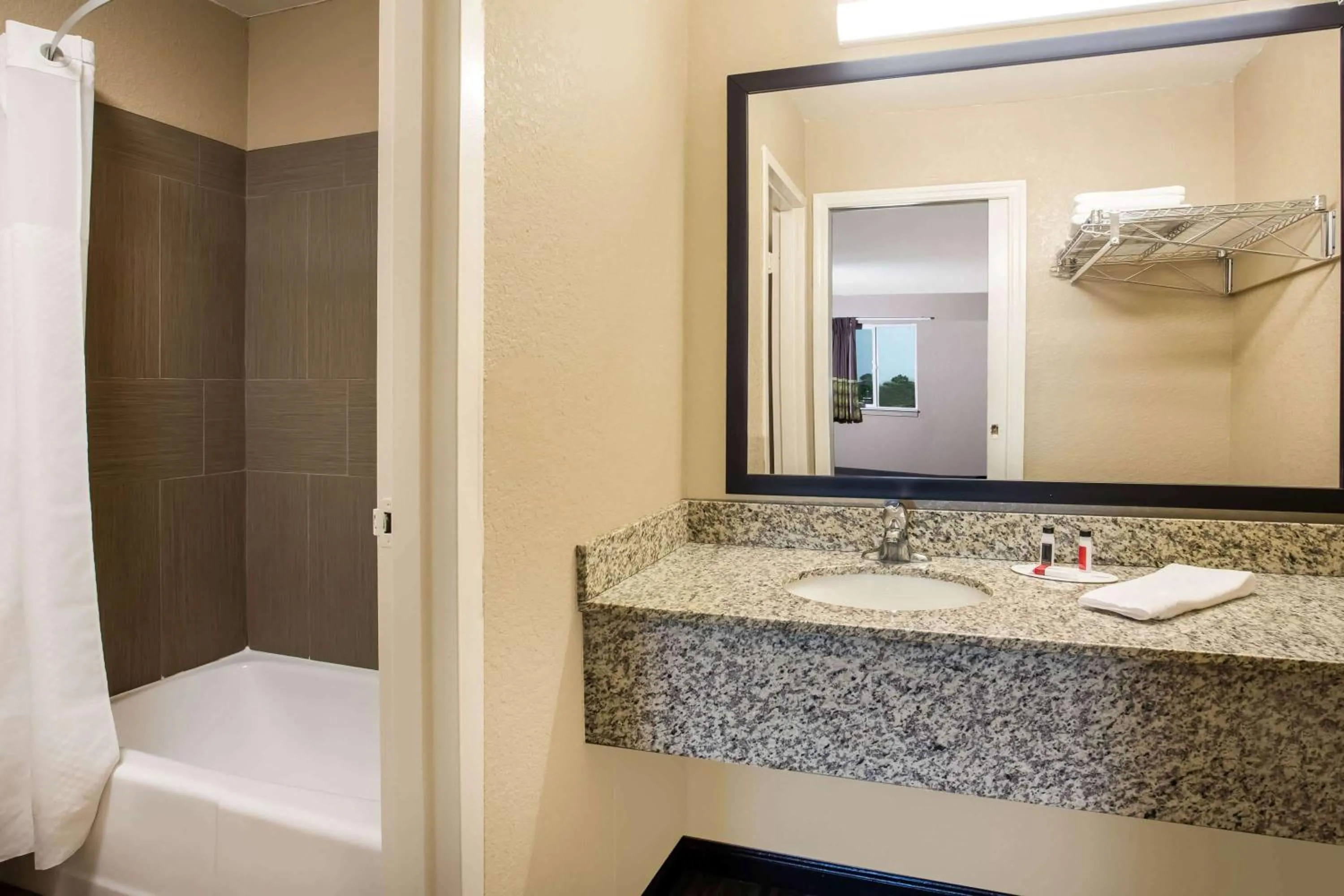 Bathroom in Travel Inn Of Sidney Ohio