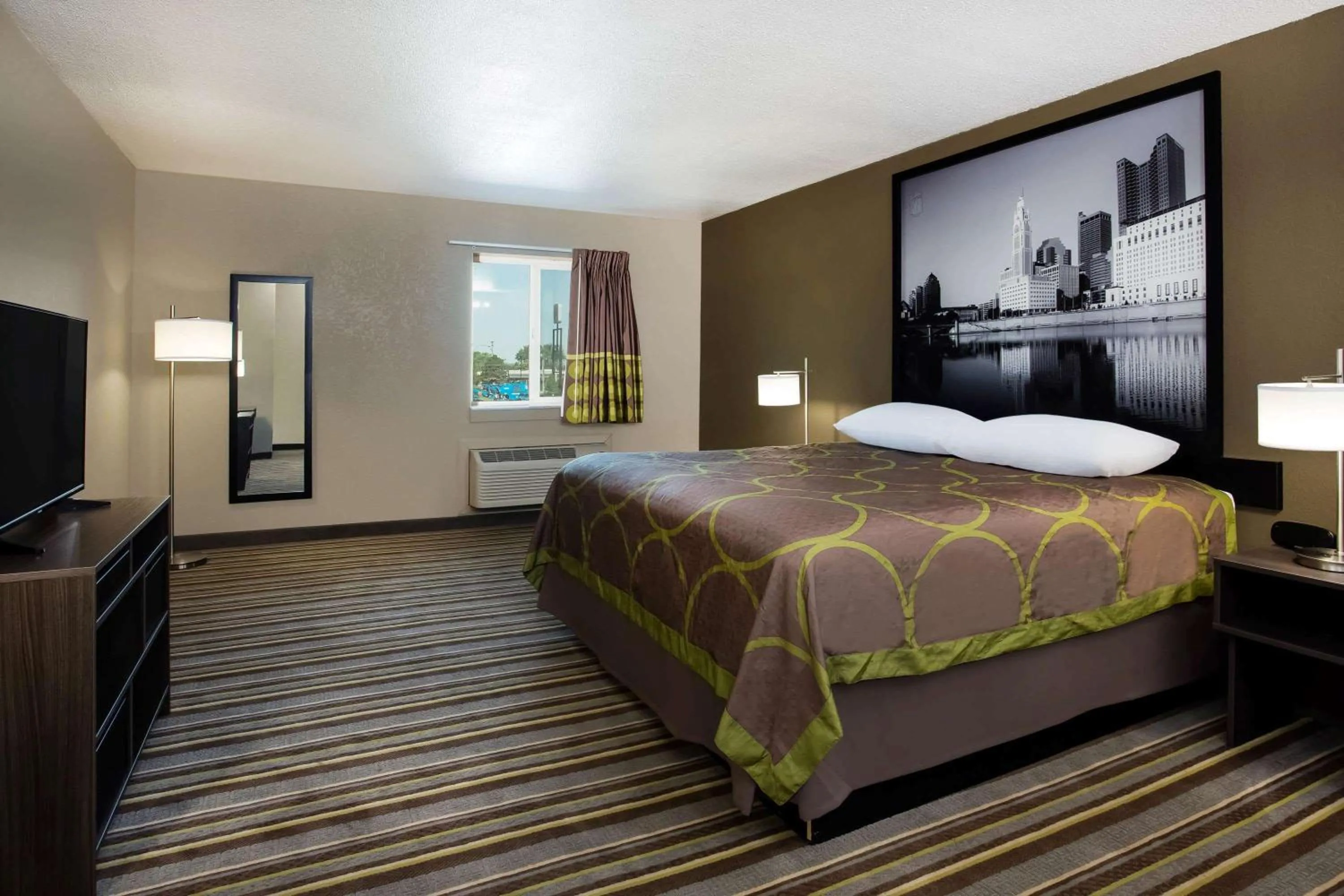 Photo of the whole room, Bed in Travel Inn Of Sidney Ohio