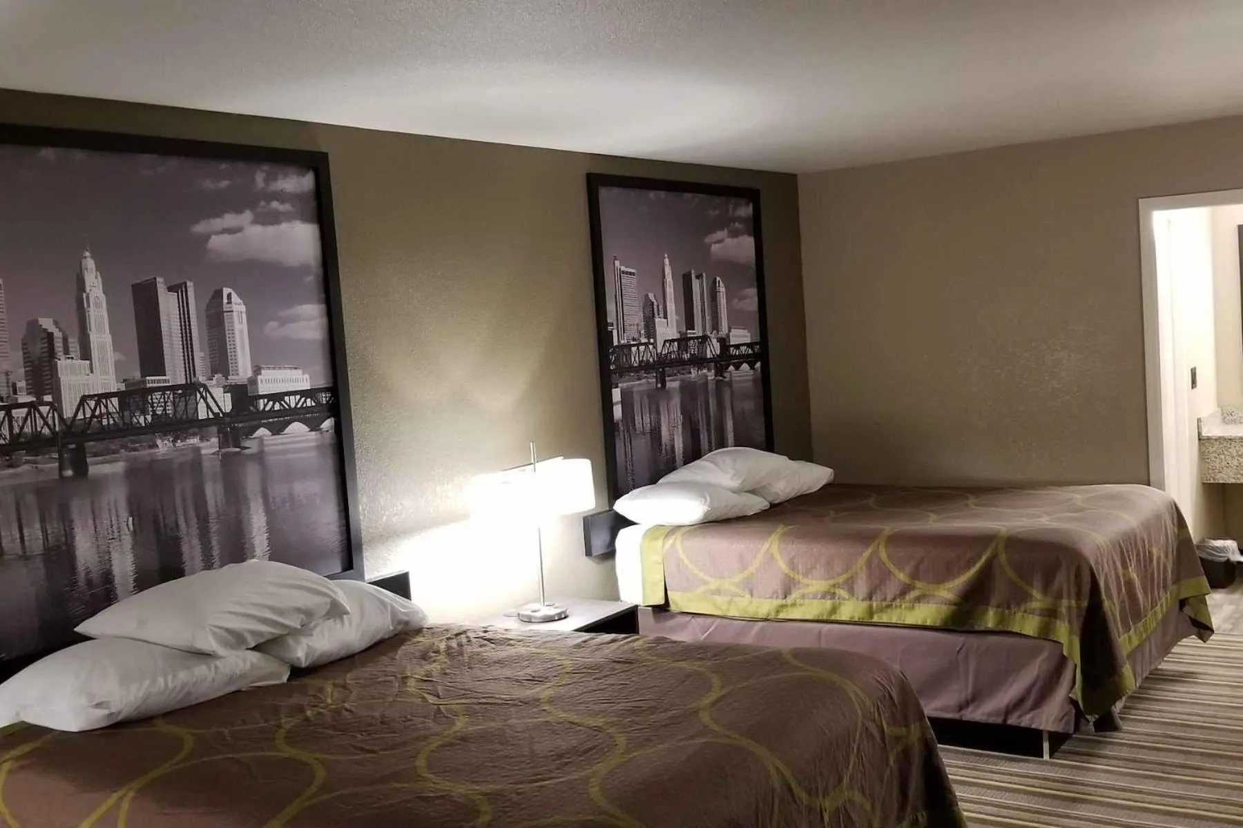 Photo of the whole room, Bed in Travel Inn Of Sidney Ohio