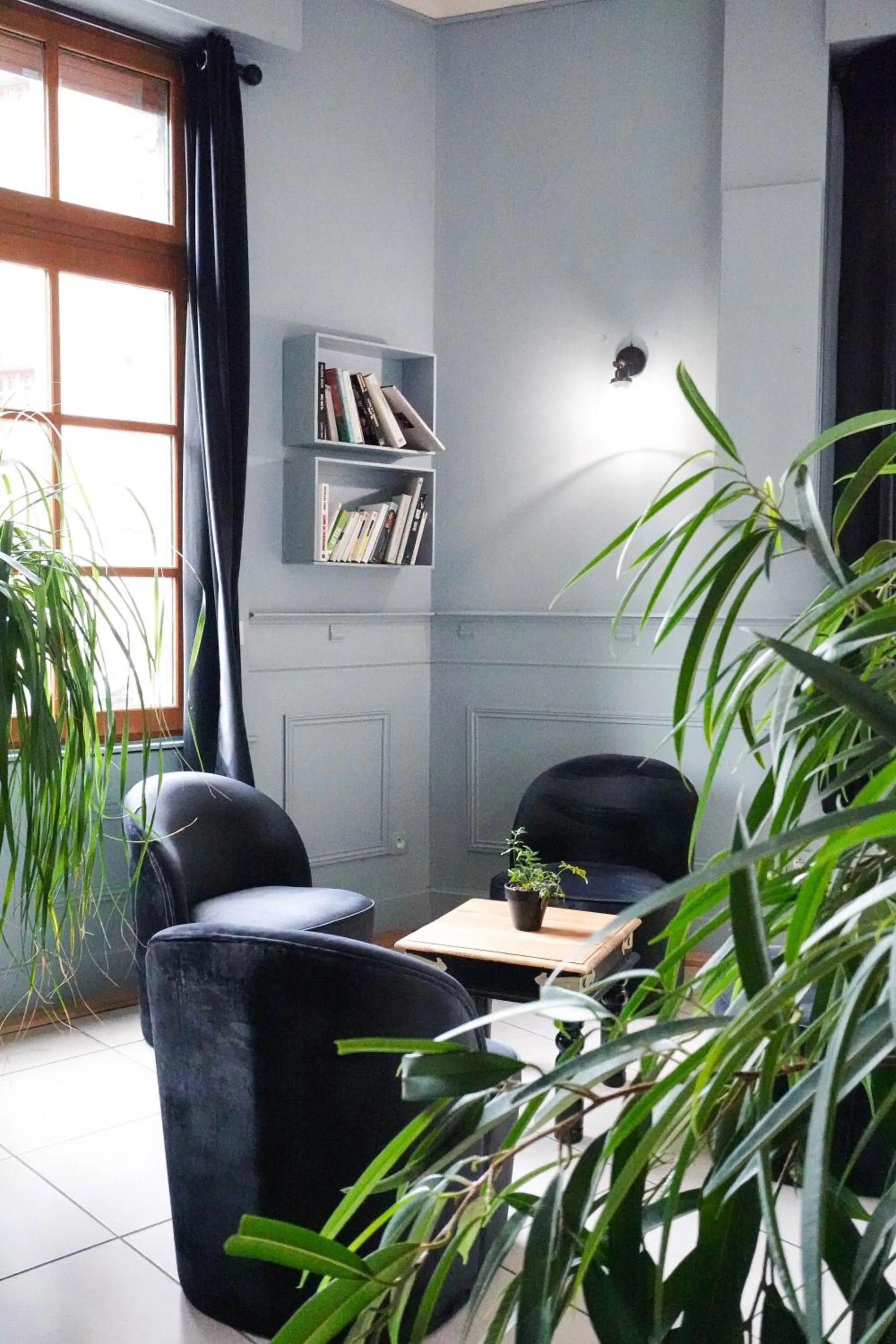 Communal lounge/ TV room in Hôtel - Restaurant Au Tonnelier