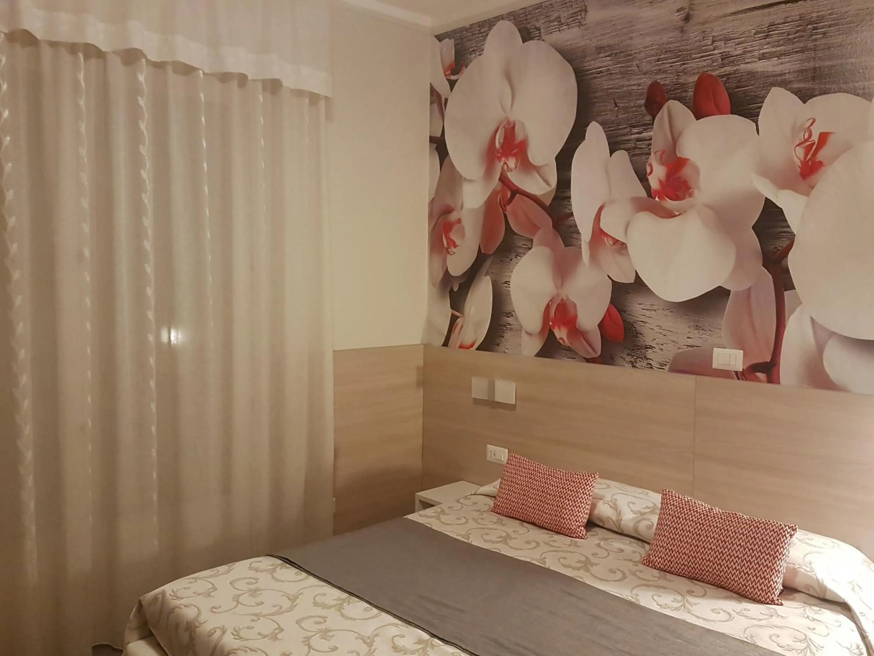 Bed in Albergo Paradiso