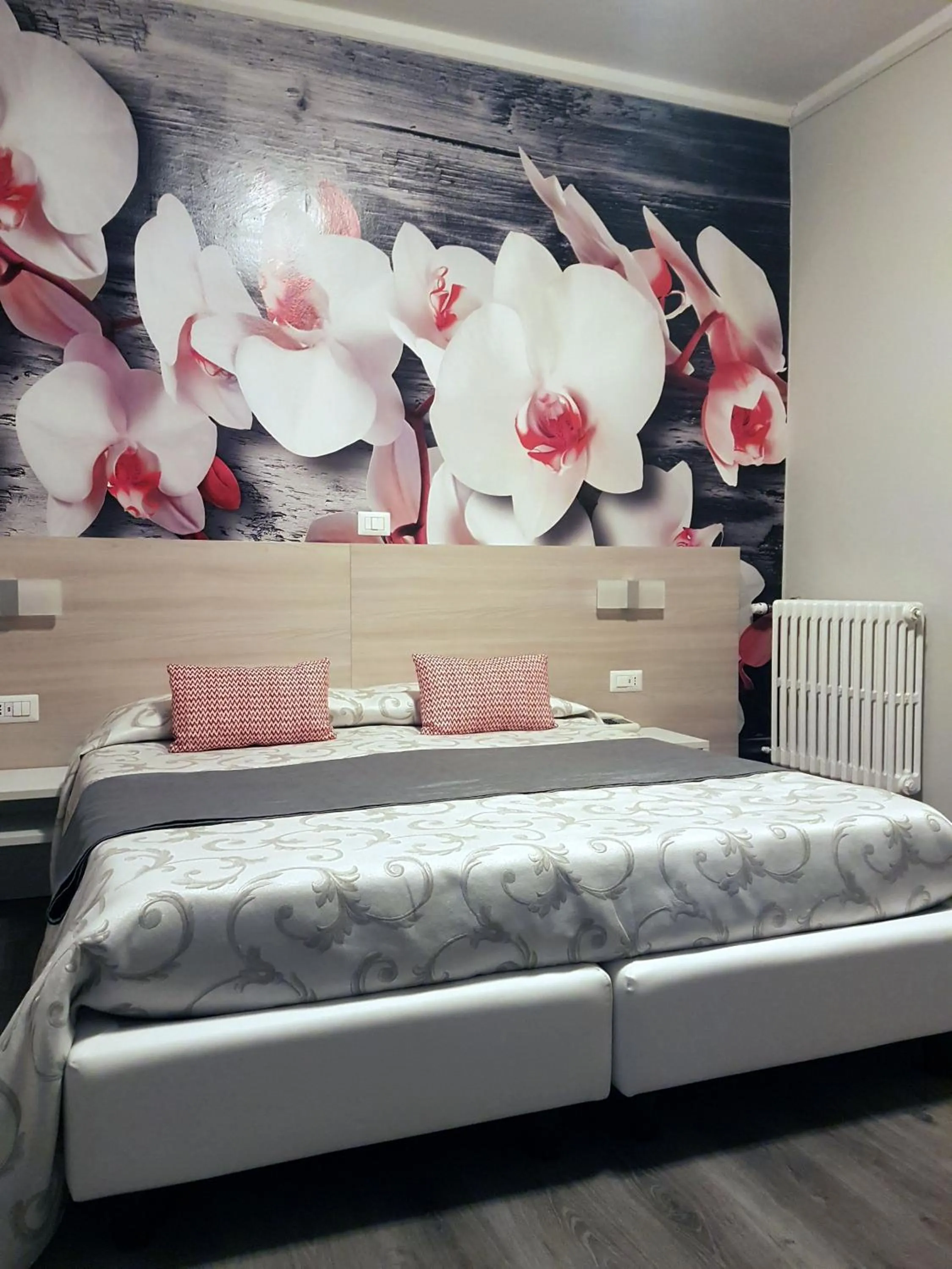 Bed in Albergo Paradiso