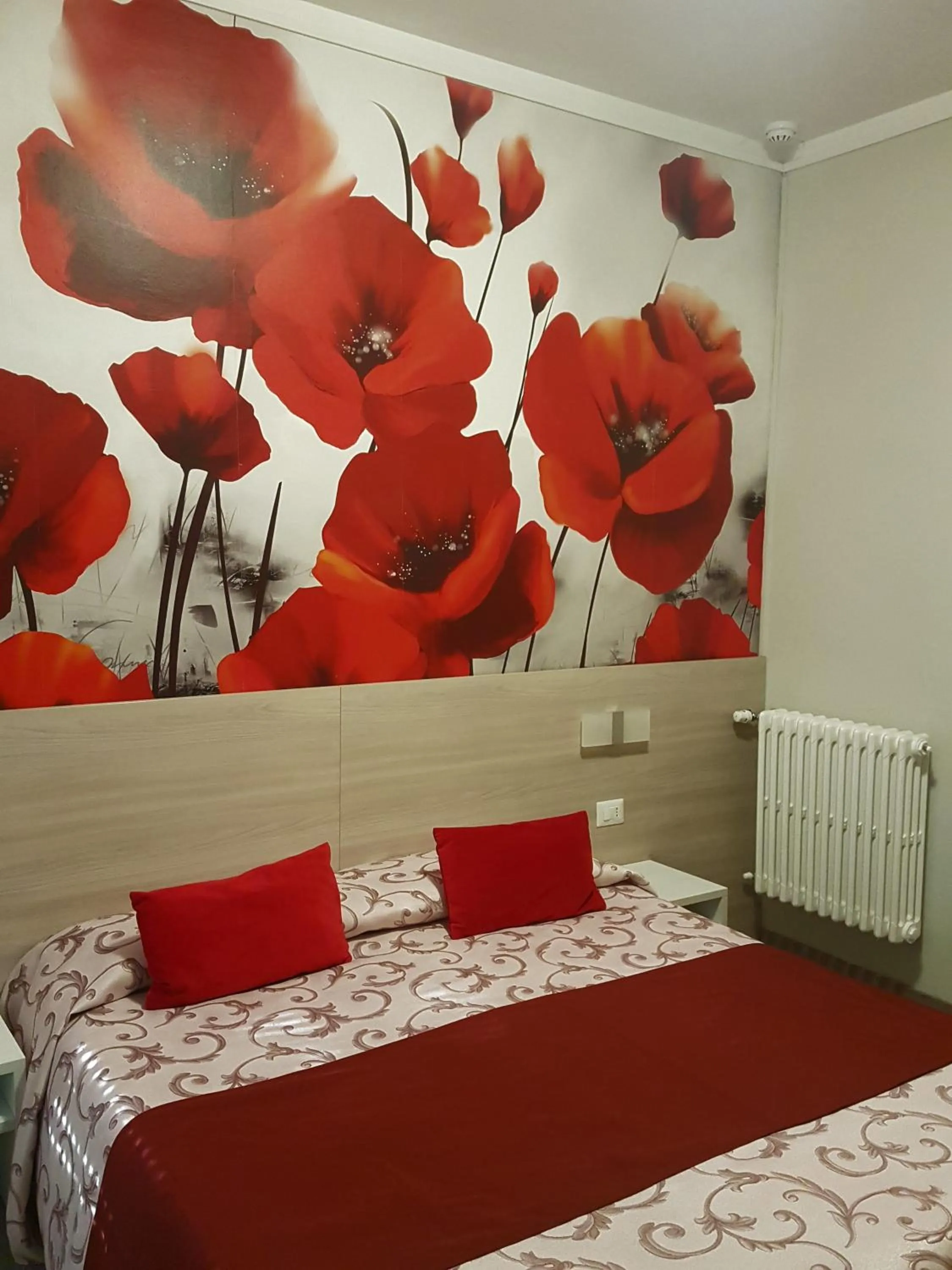 Bed in Albergo Paradiso