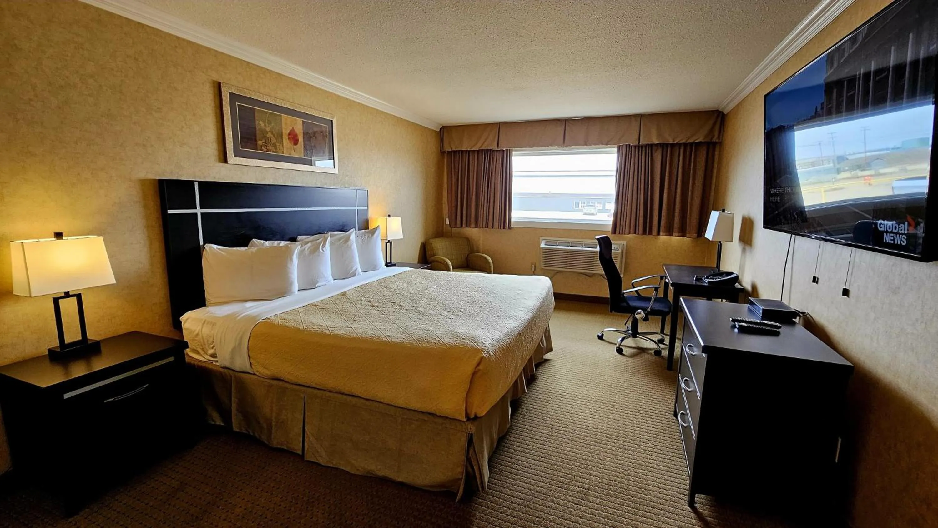 Bed in The George Dawson Inn & Conference Centre