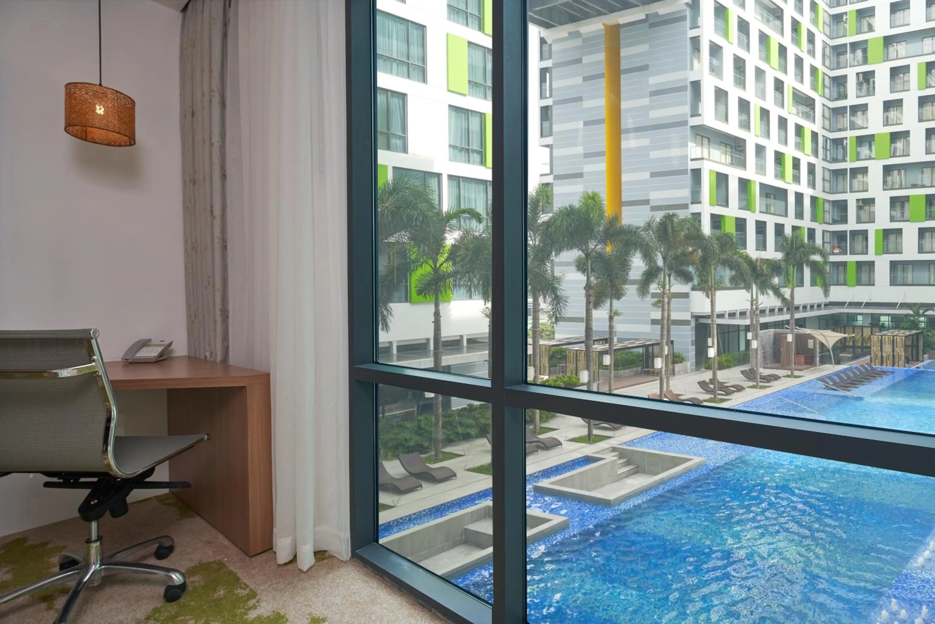 Pool view in Holiday Inn & Suites Saigon Airport by IHG
