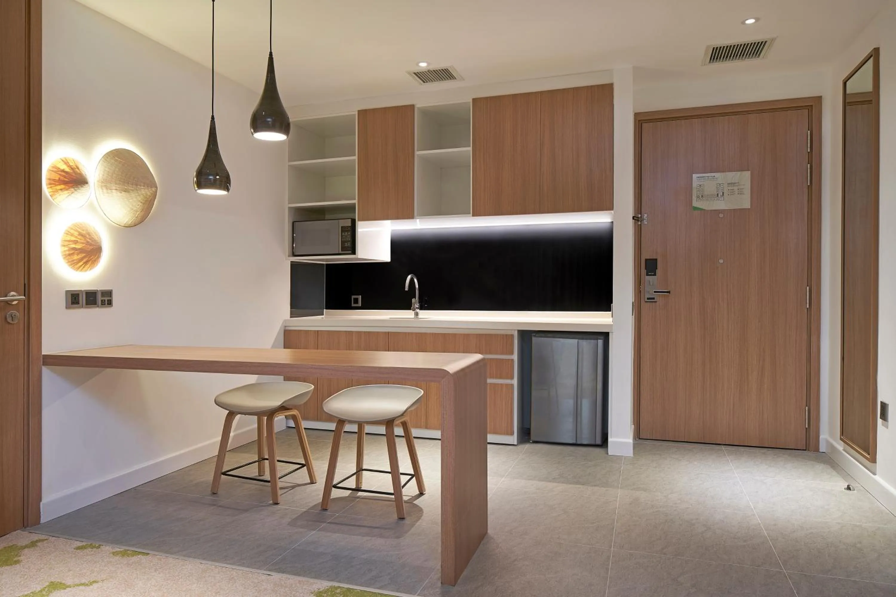 Kitchen or kitchenette in Holiday Inn & Suites Saigon Airport by IHG
