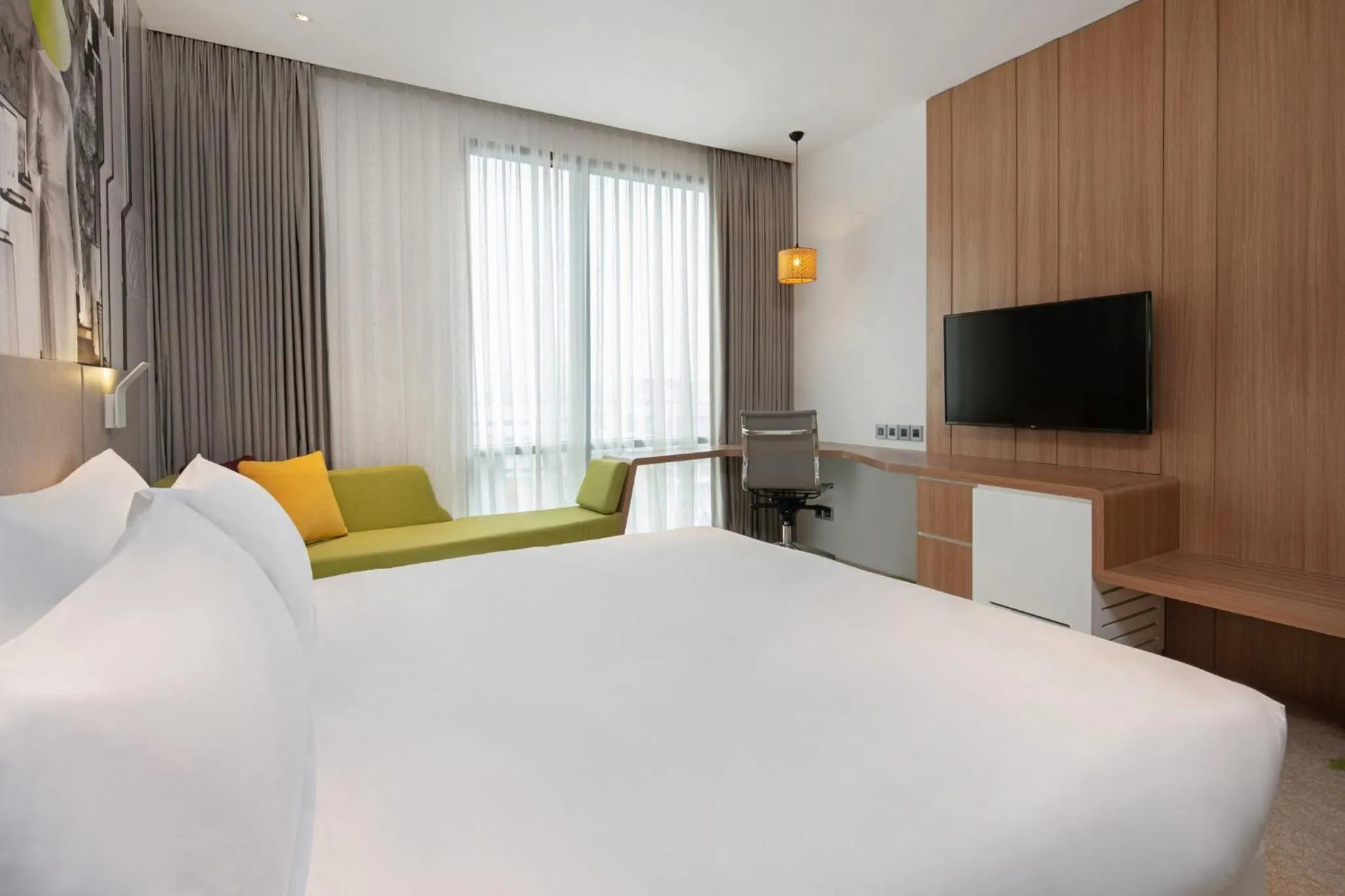 Photo of the whole room, Bed in Holiday Inn & Suites Saigon Airport by IHG