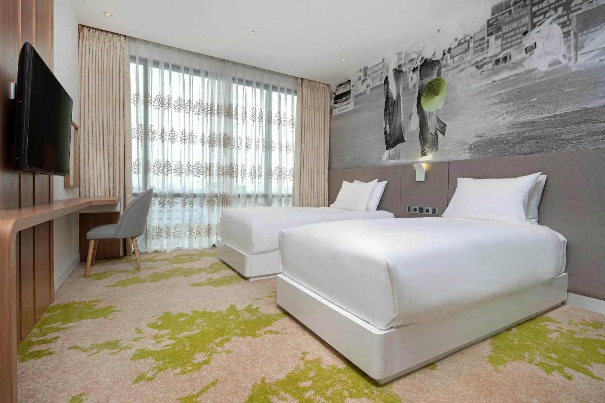 Photo of the whole room, Bed in Holiday Inn & Suites Saigon Airport by IHG