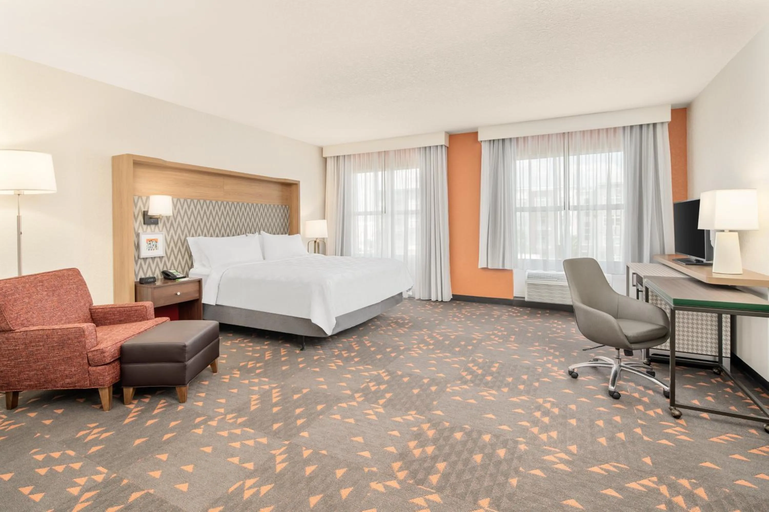 Photo of the whole room, Bed in Holiday Inn & Suites Orlando - I-Drive - Theme Parks by IHG