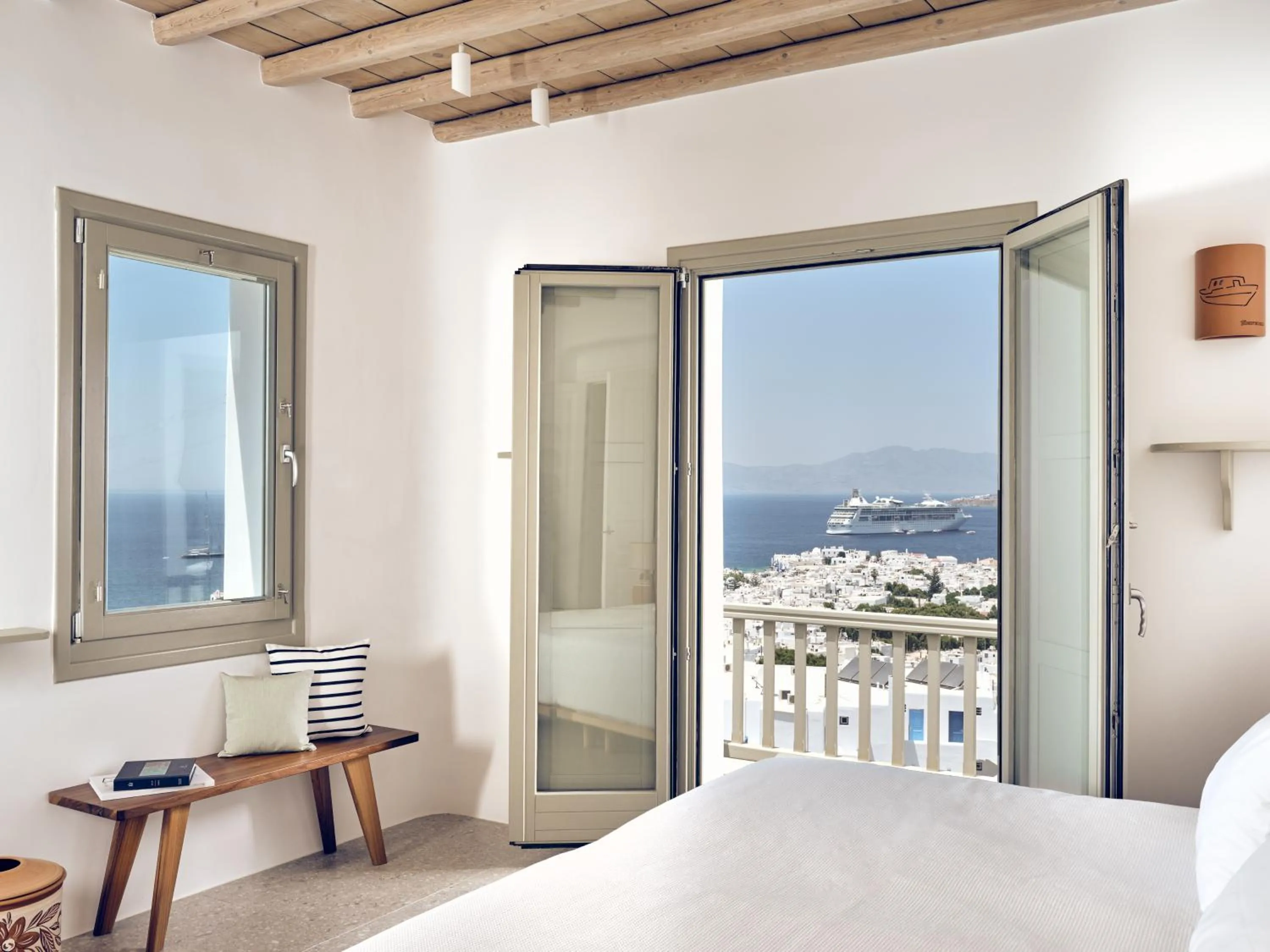 Balcony/Terrace, Bed in Belvedere Mykonos - Hilltop Rooms & Suites - The Leading Hotels of the World
