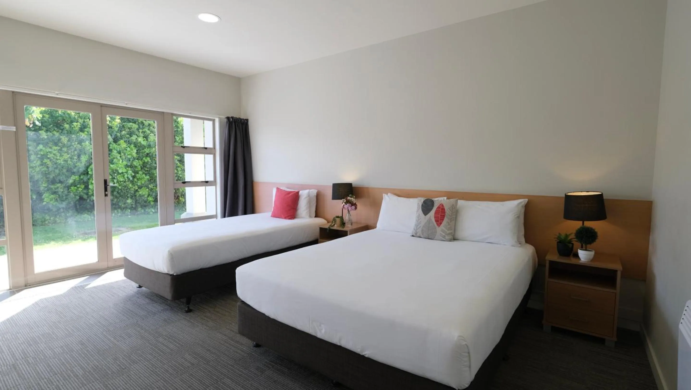 Bed in The Garden Hotel