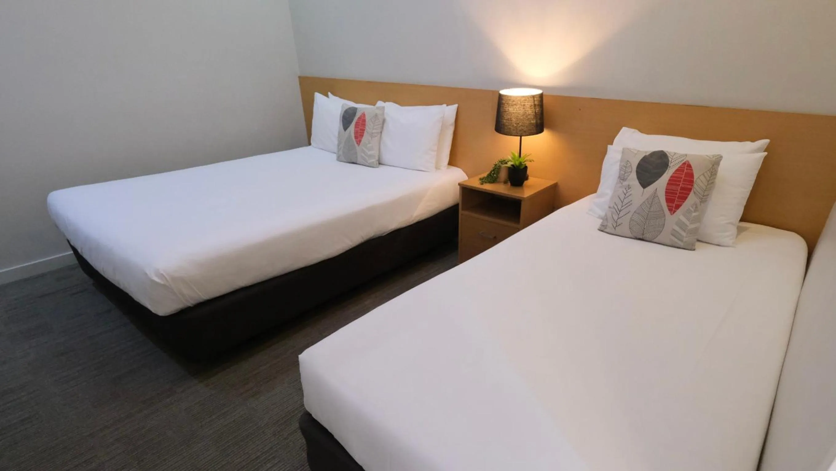 Bed in The Garden Hotel