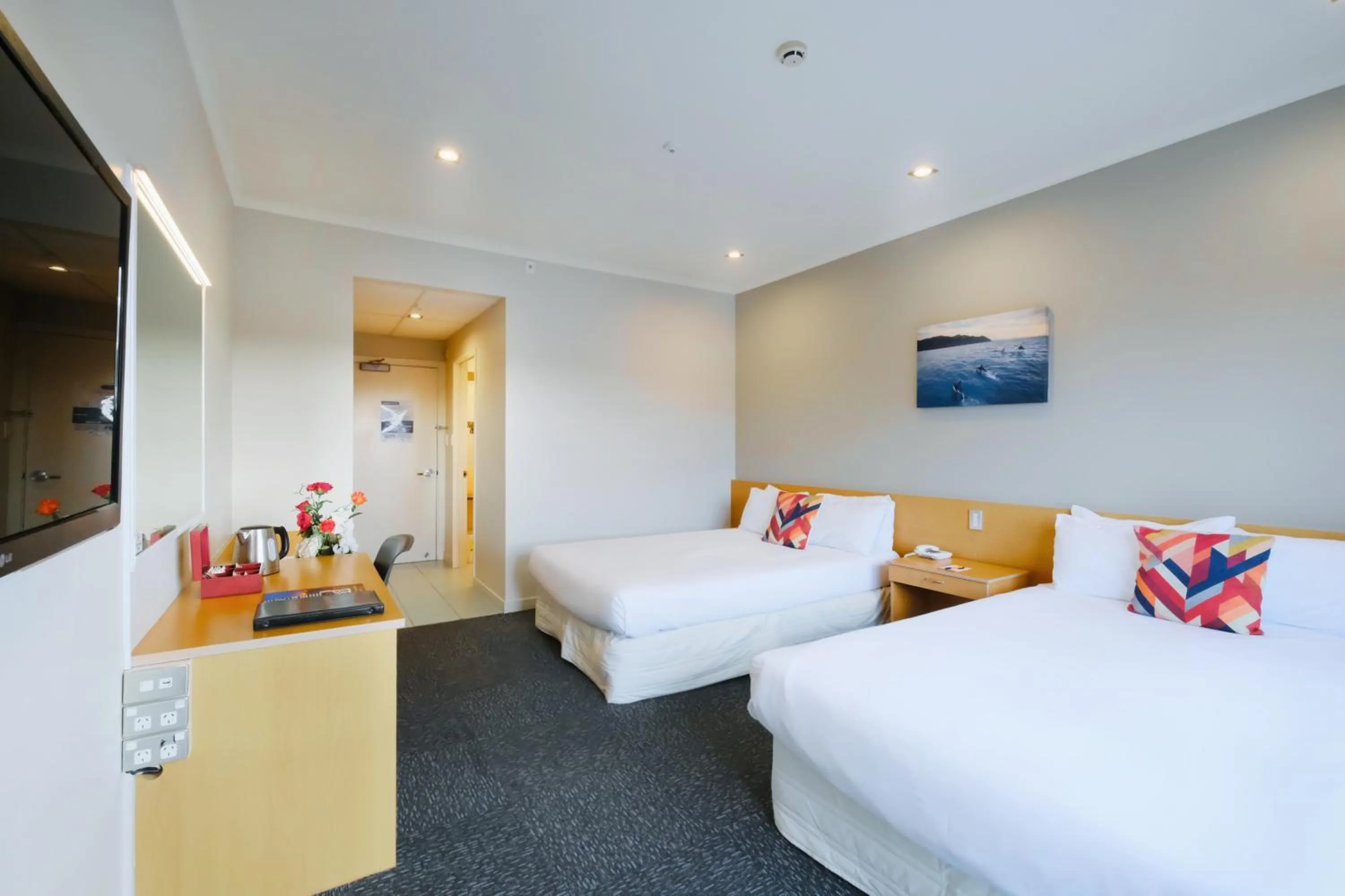 Bed in The Garden Hotel