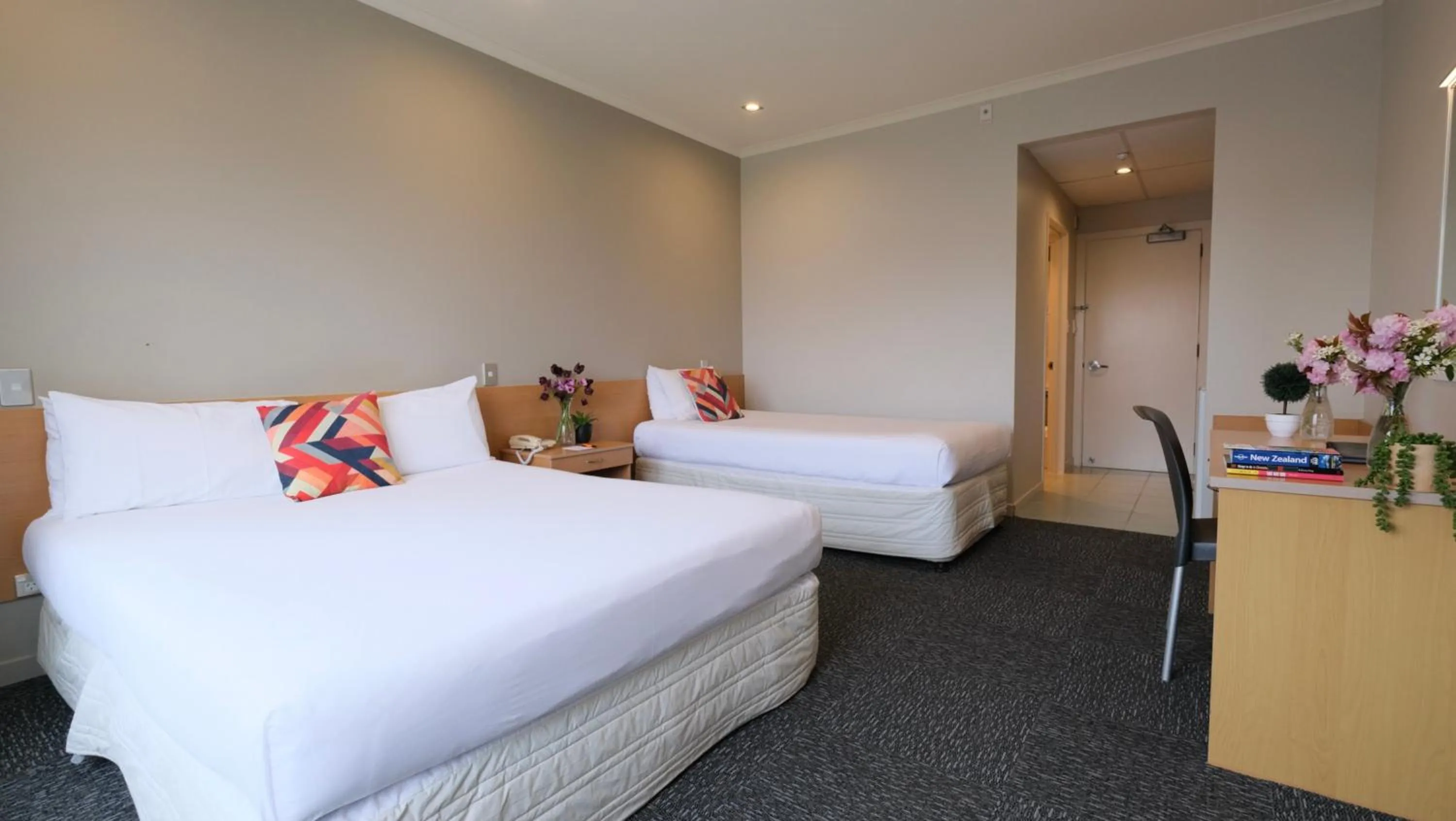 Bed in The Garden Hotel