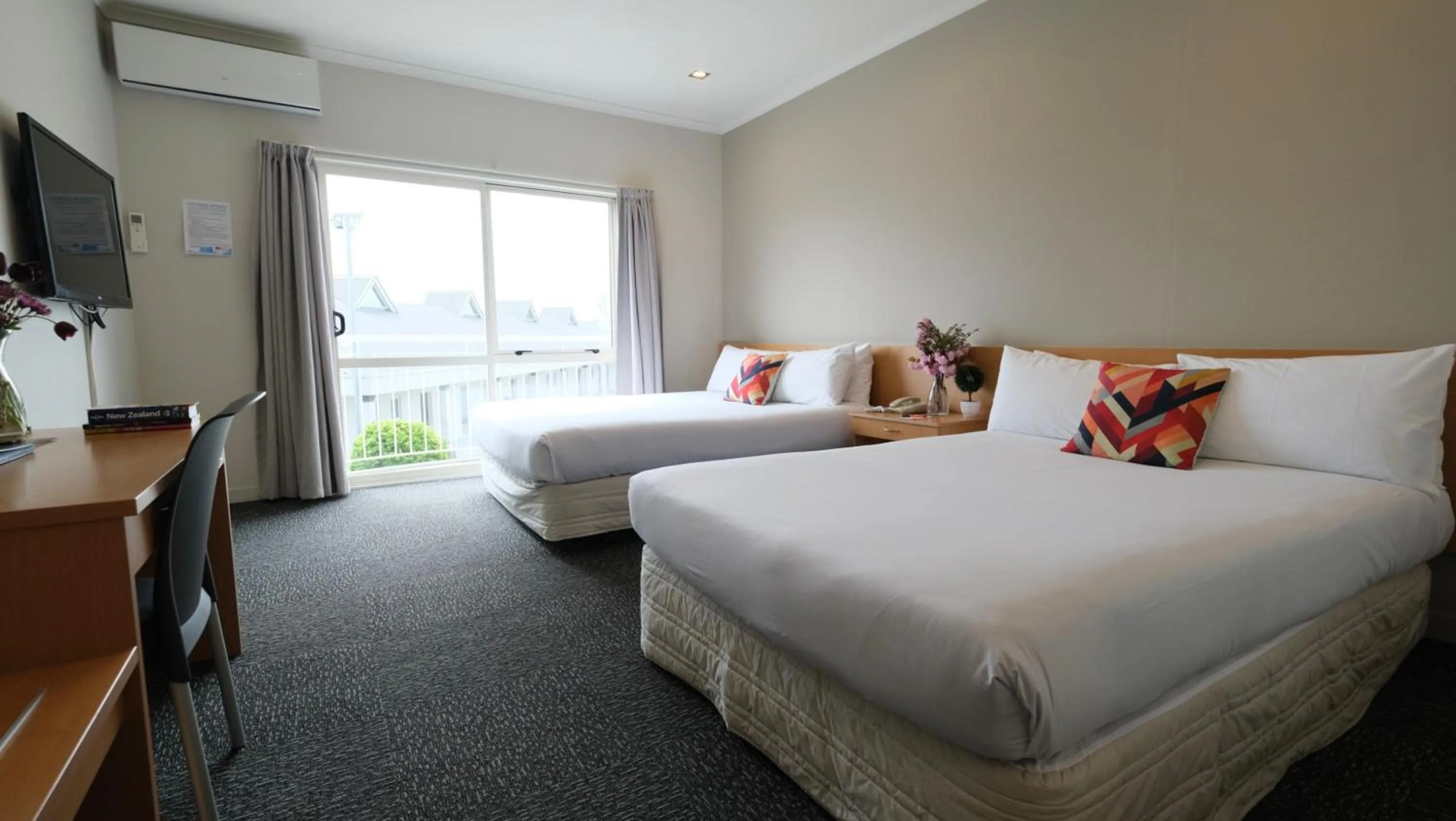 Bed in The Garden Hotel