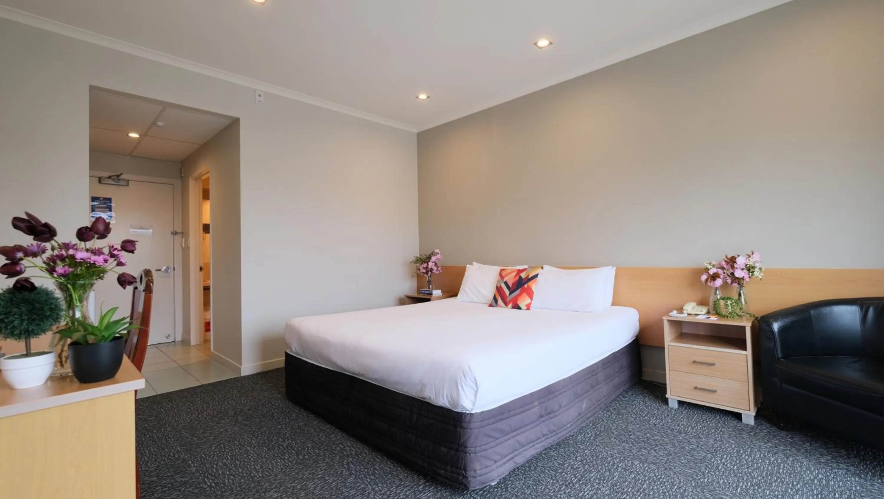 Bed in The Garden Hotel