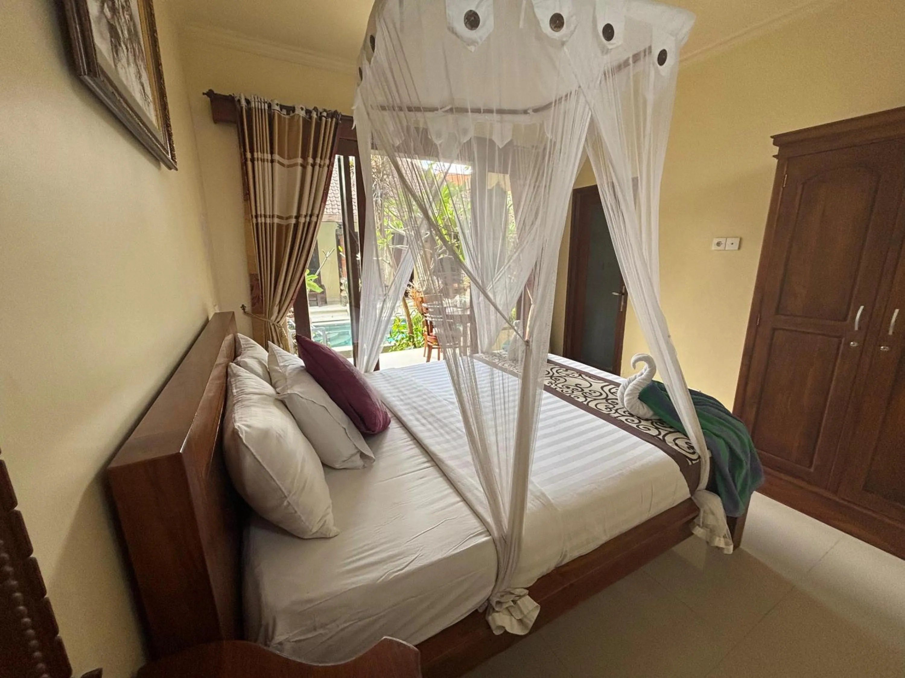 Bed in Suparsa's Homestay